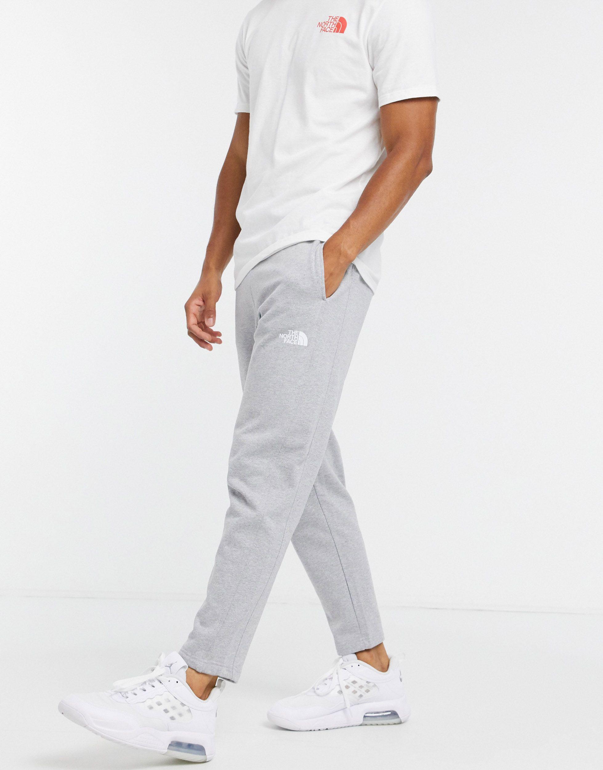 grey north face trackies