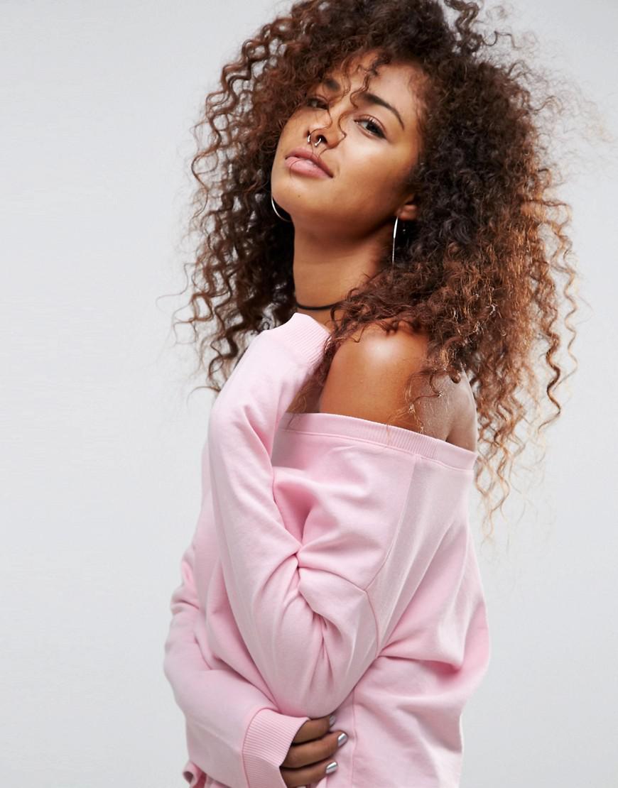pink off the shoulder sweatshirt