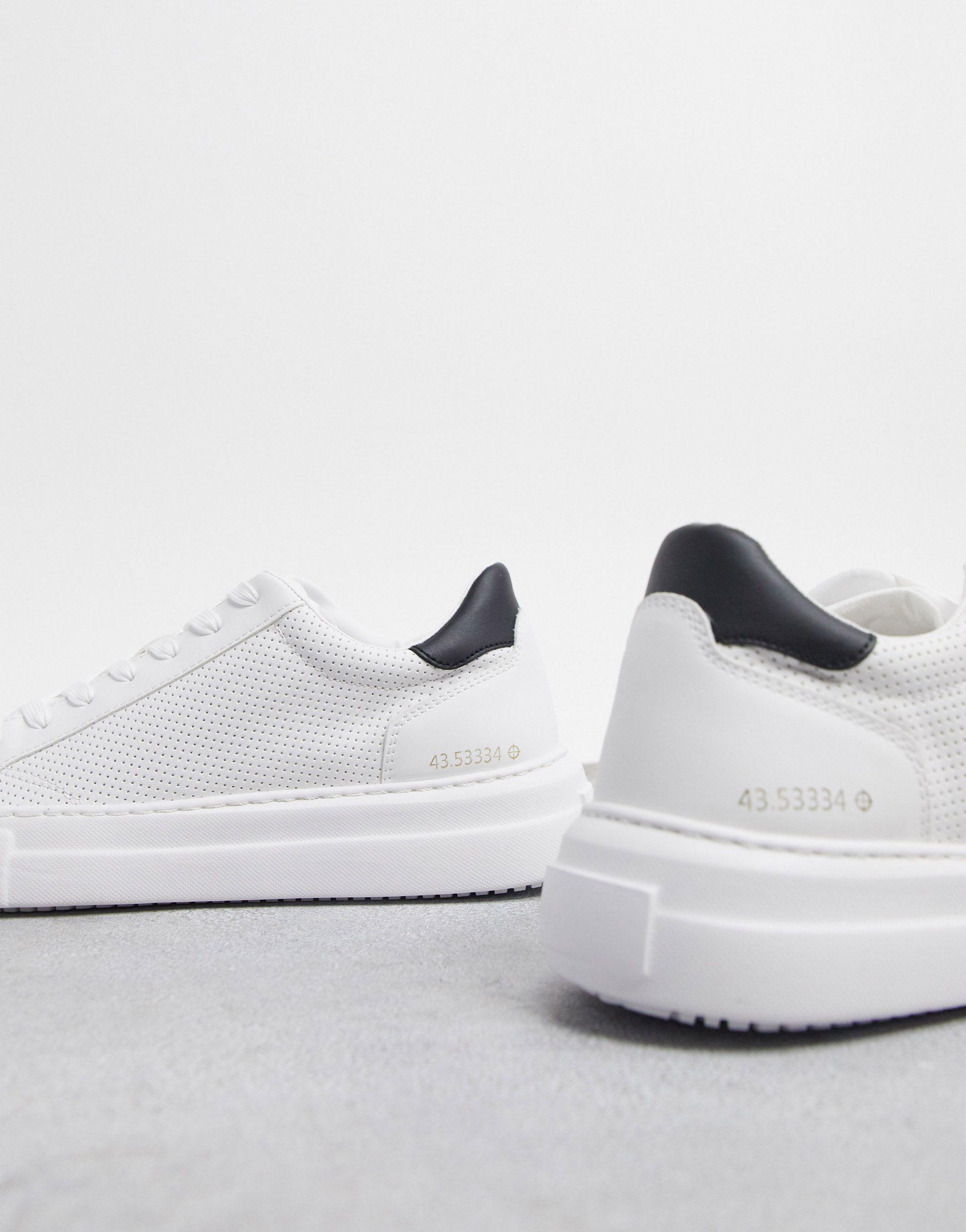 Zapatillas blancas con suela gruesa y tal n en contraste Pull Bear