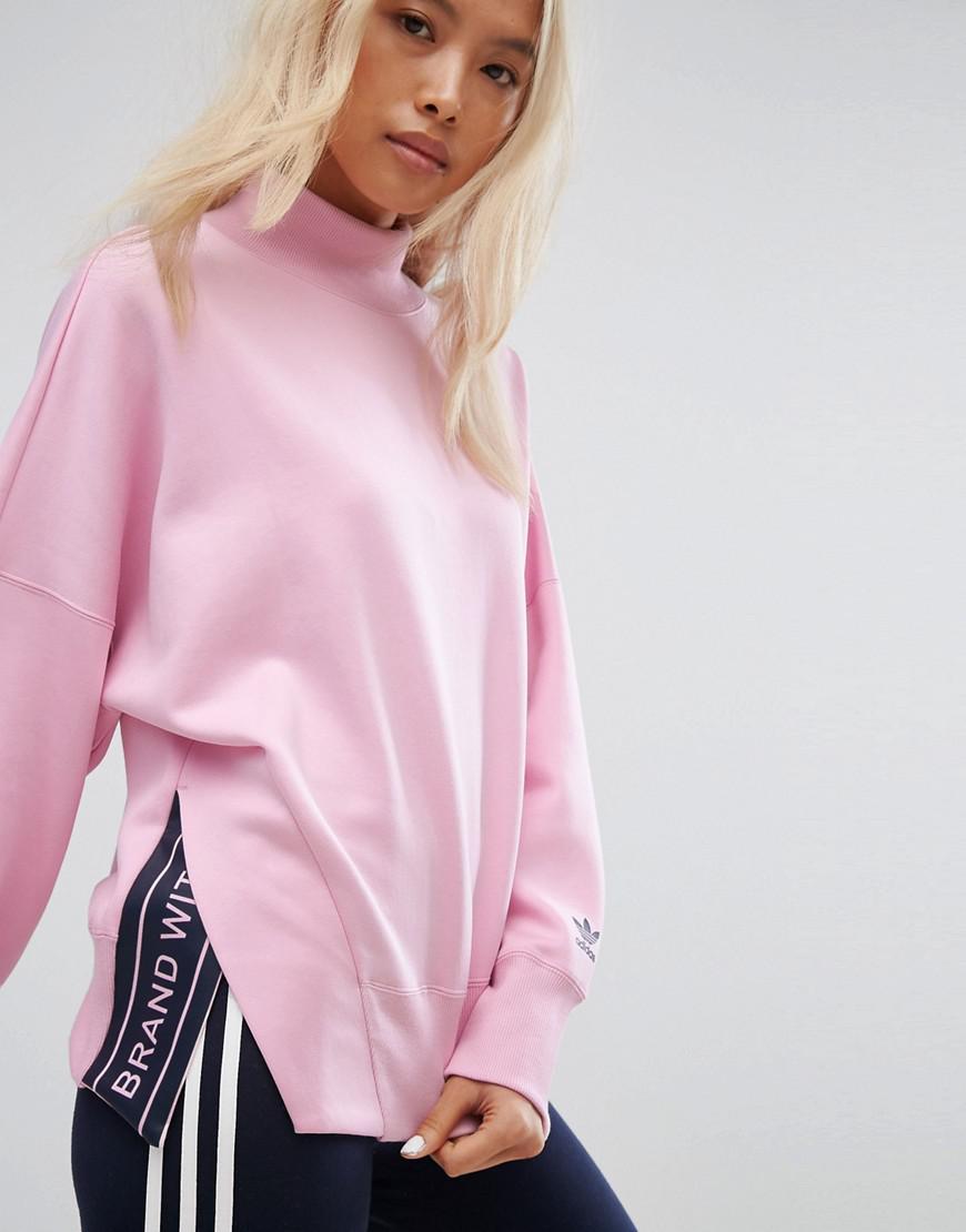 pink high neck sweatshirt by adidas