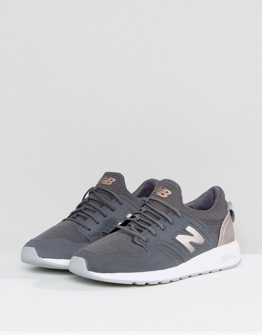 new balance 420 trainers with rose gold trim in grey