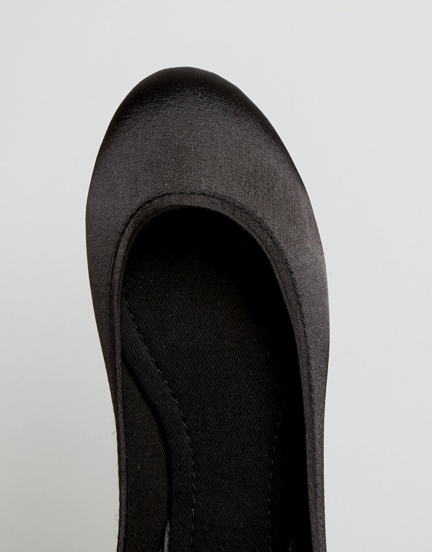 black ballet flats with ribbon ties
