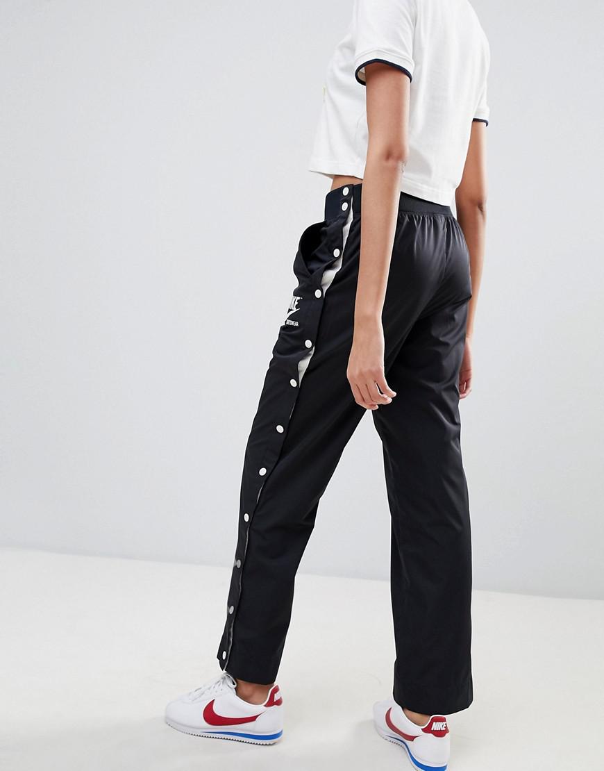 nike archive joggers with popper in white