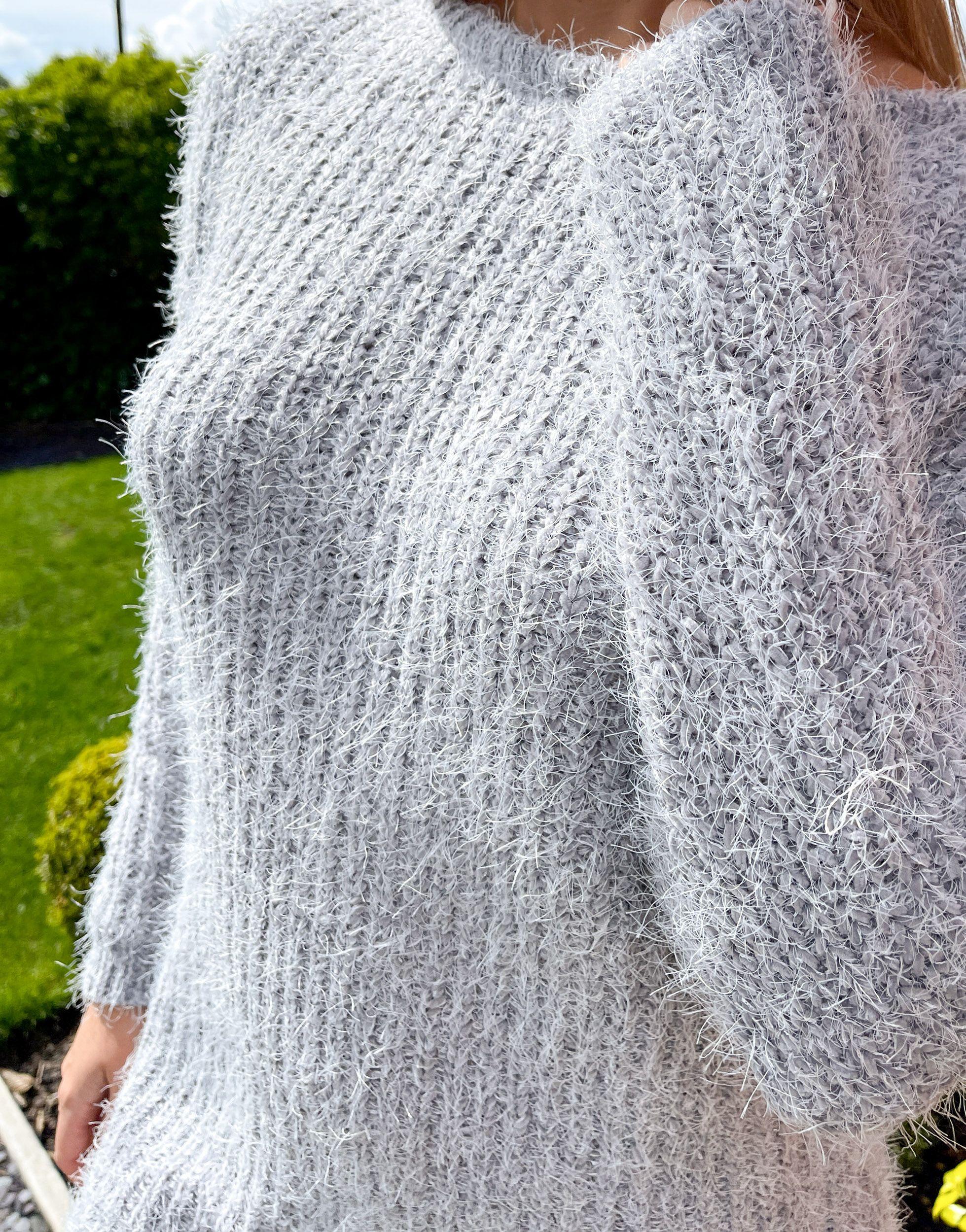 grey fluffy jumper