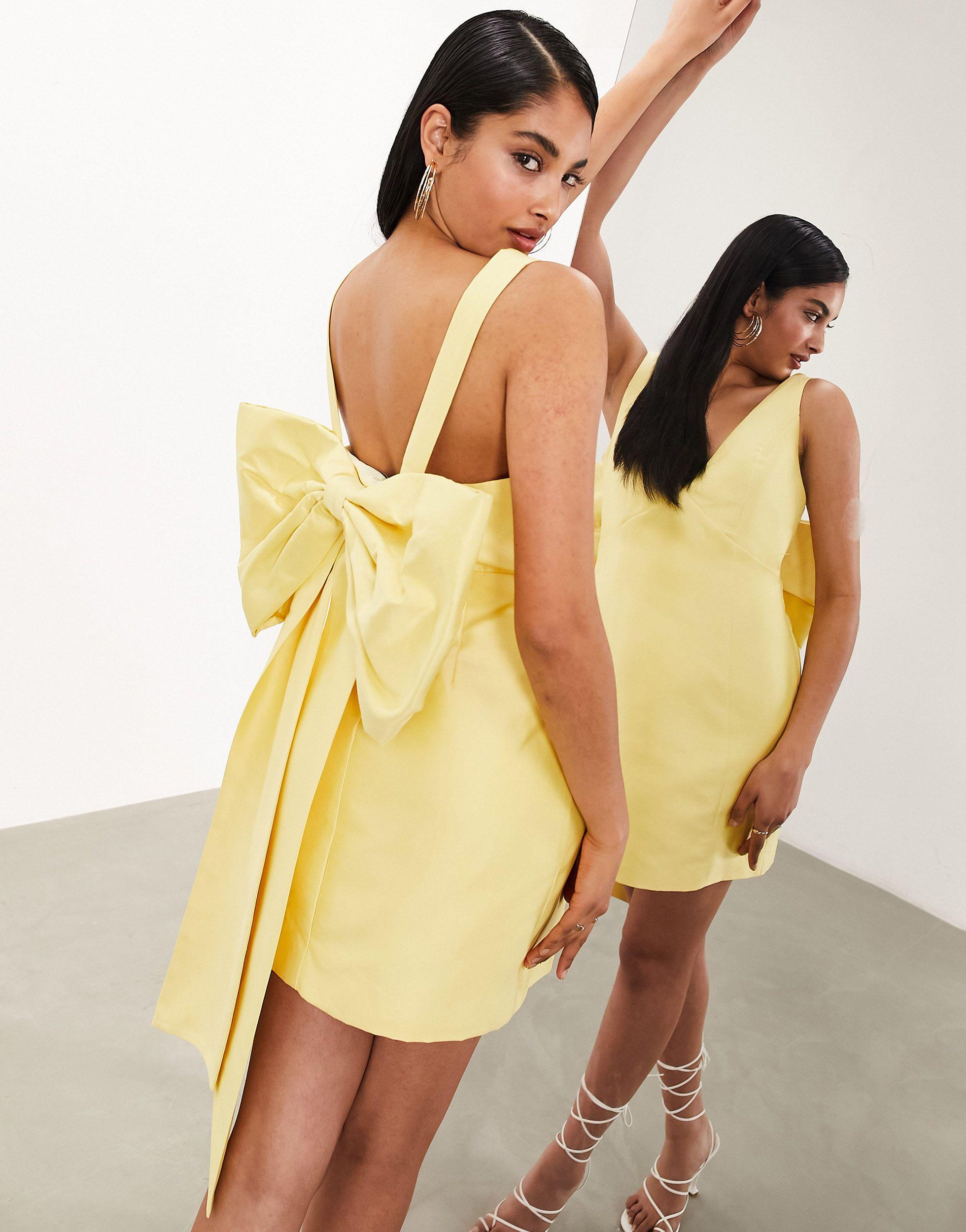 Mini Dress with Structured Sleeves and Open-Back Bow Detail - Red main image 0