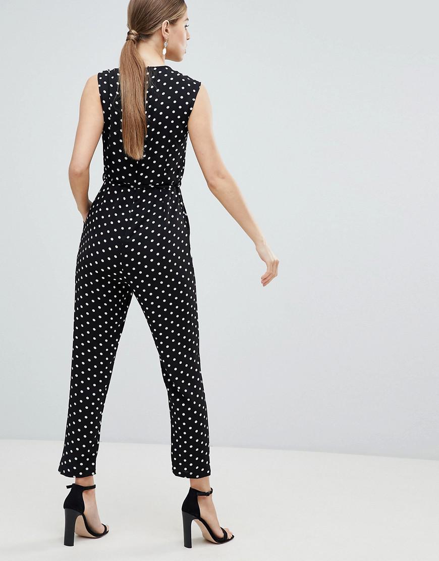 Ax Paris Wrap Front Polka Dot Jumpsuit In Black Lyst
