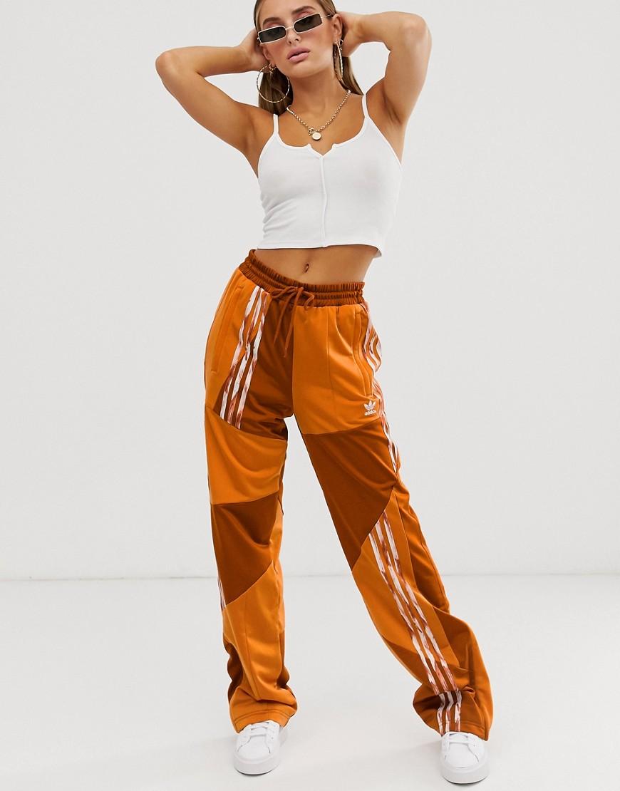 adidas Originals Danielle Cathari Deconstructed Firebird - Trainingsbroek  In Oranje in het Oranje - Lyst