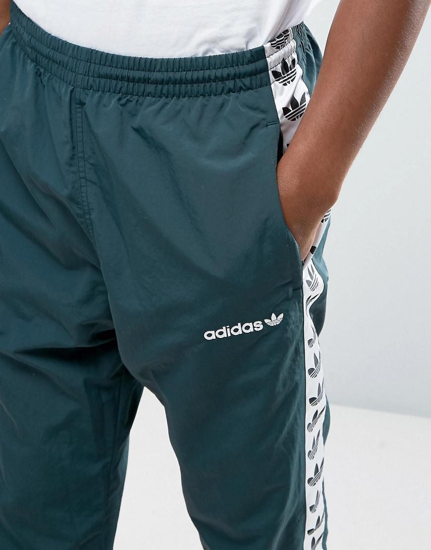 adidas Originals Synthetic Adicolor Tnt Tape Wind Track Joggers In Green  Br6968 for Men - Lyst