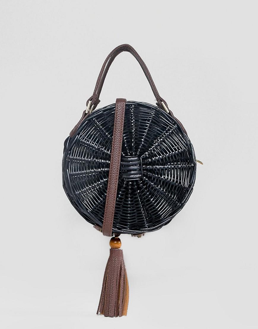 round black cross body bag