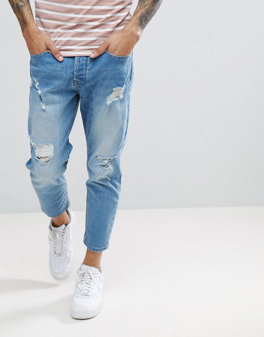 Solid Tapered Cropped Jeans With Rips In Light Blue for Men | Lyst