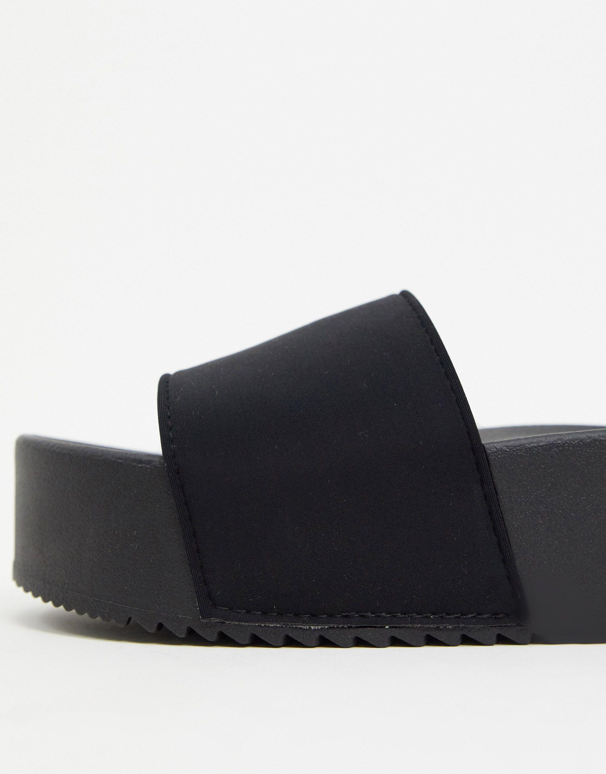 black flatform sliders