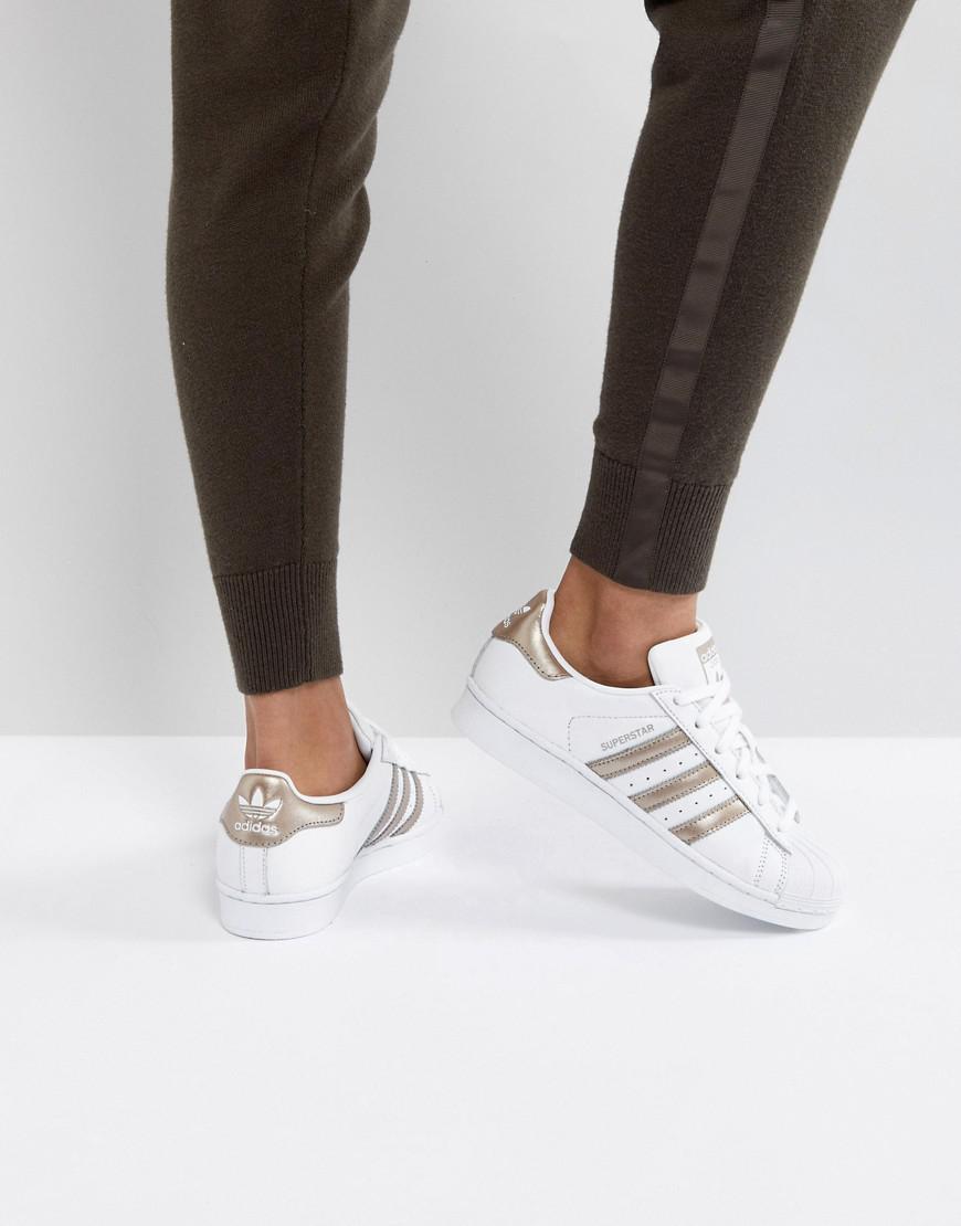 rose gold and white superstars
