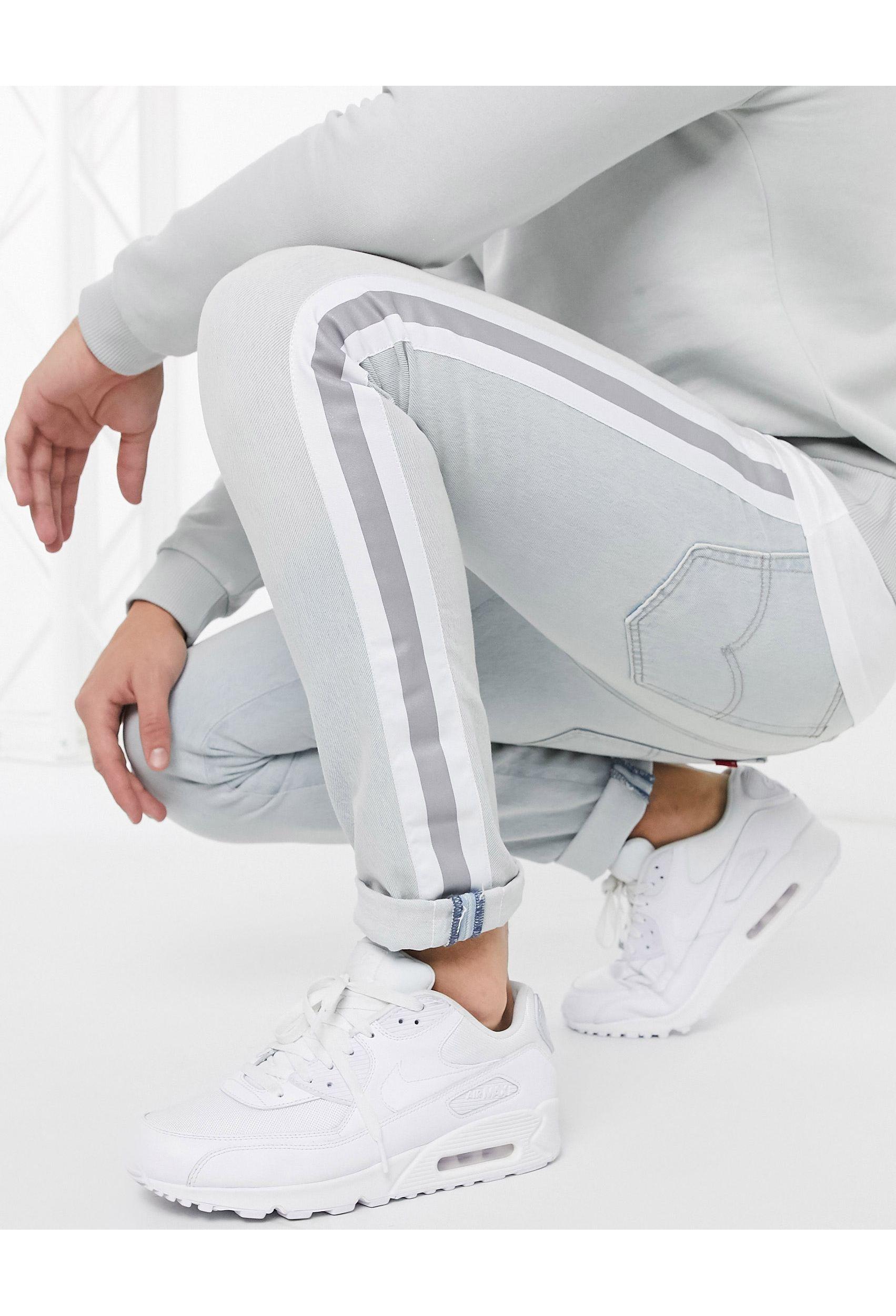 side tape slim jeans