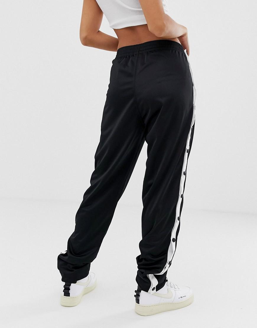 Champion Synthetic Popper Tracksuit Bottoms With Side Logo Co-ord in Black  | Lyst