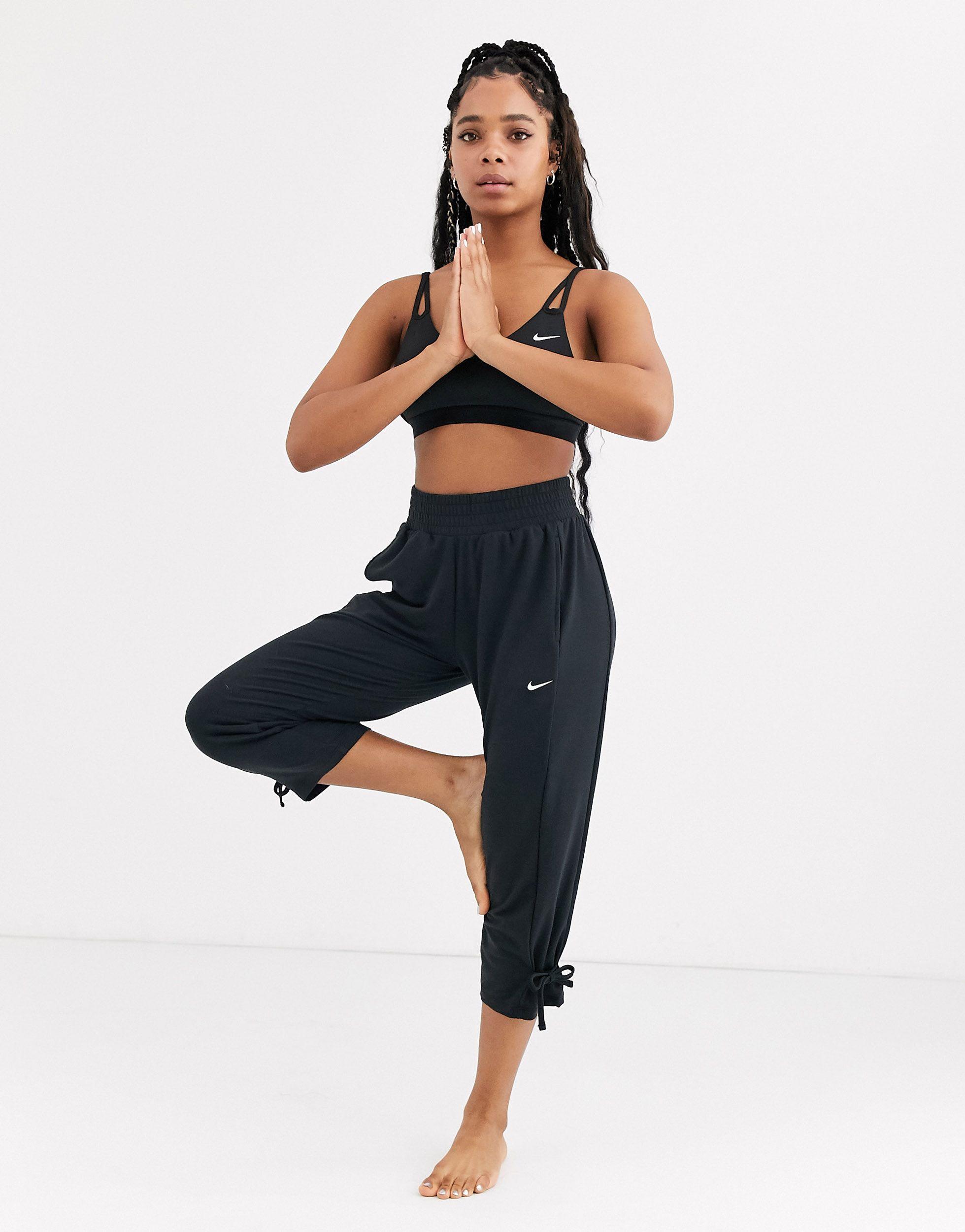 Nike Nike Yoga Loose Fit Pants With Tie Detail in Black | Lyst