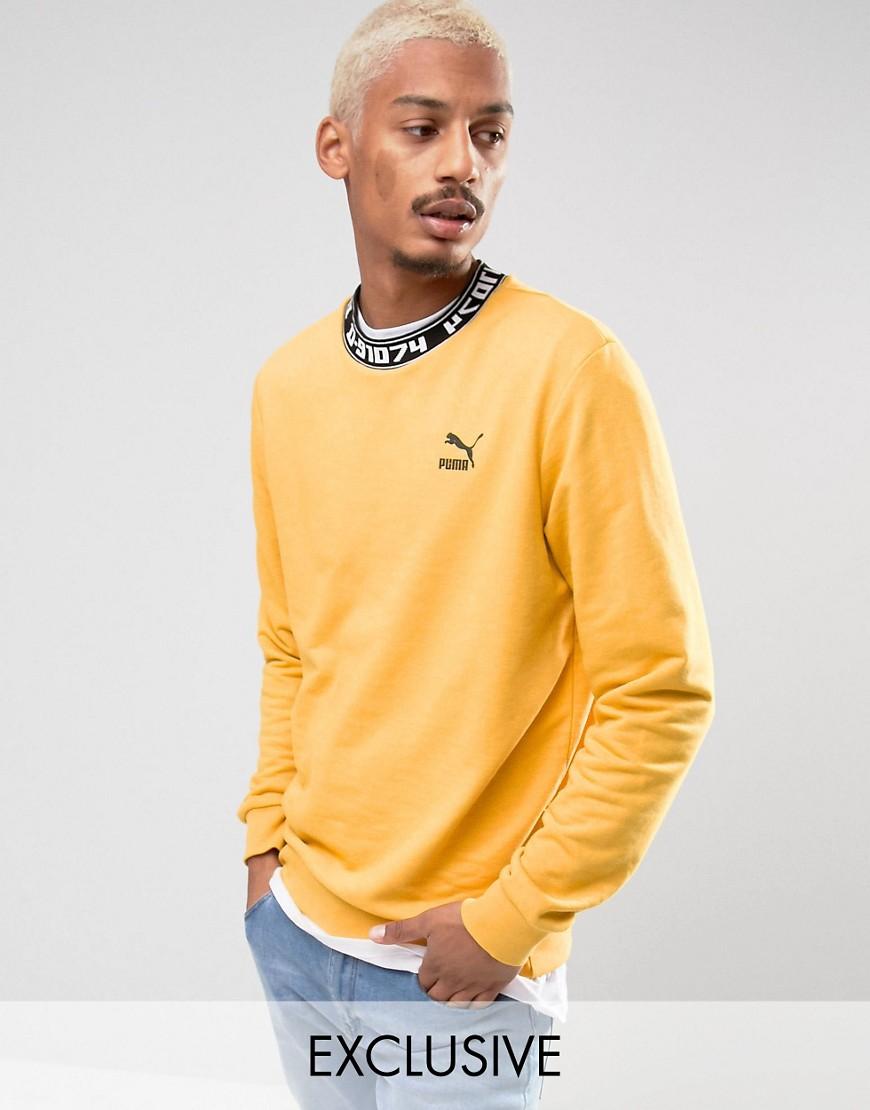 yellow puma sweater