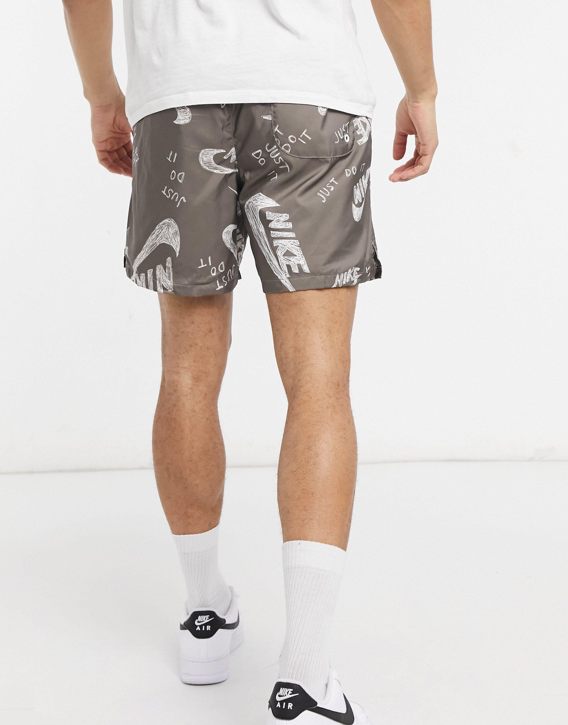 Nike All Over Logo Print Woven Shorts in Brown for Men | Lyst