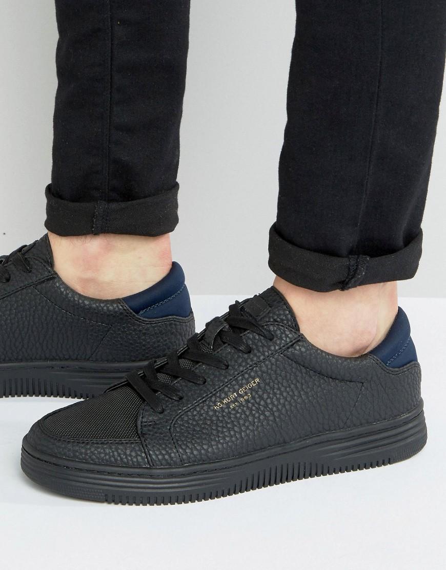 kurt geiger black and gold trainers