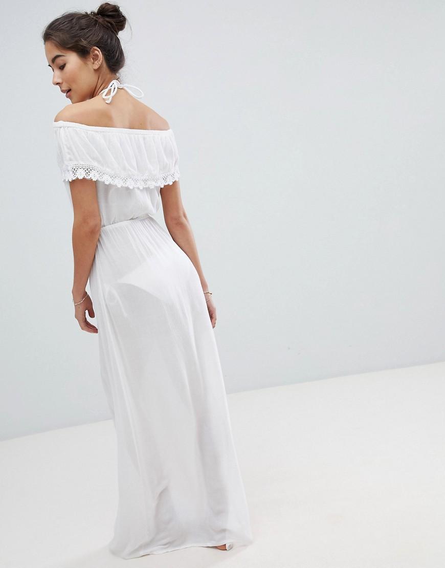 white ruffle beach dress