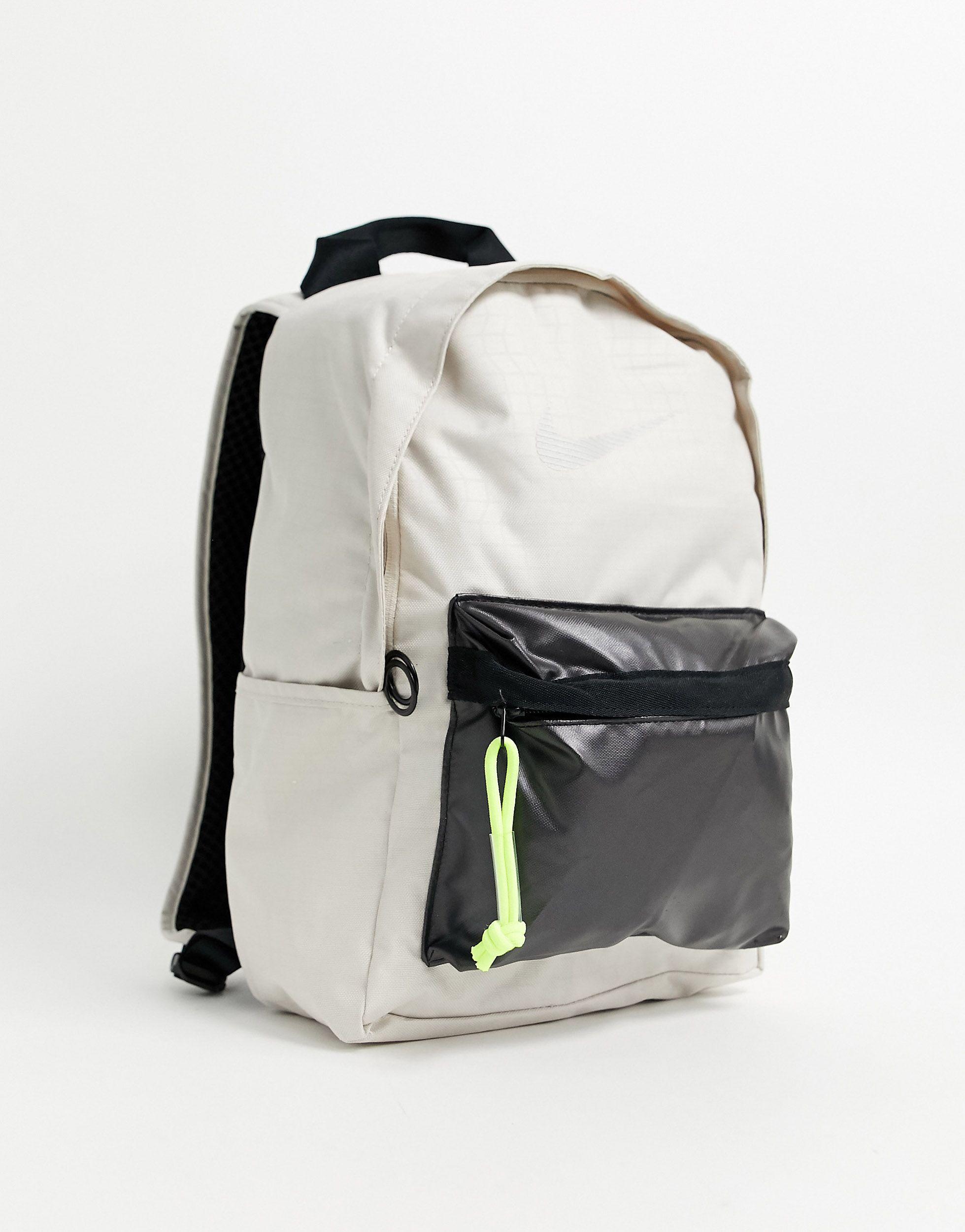beige nike backpack