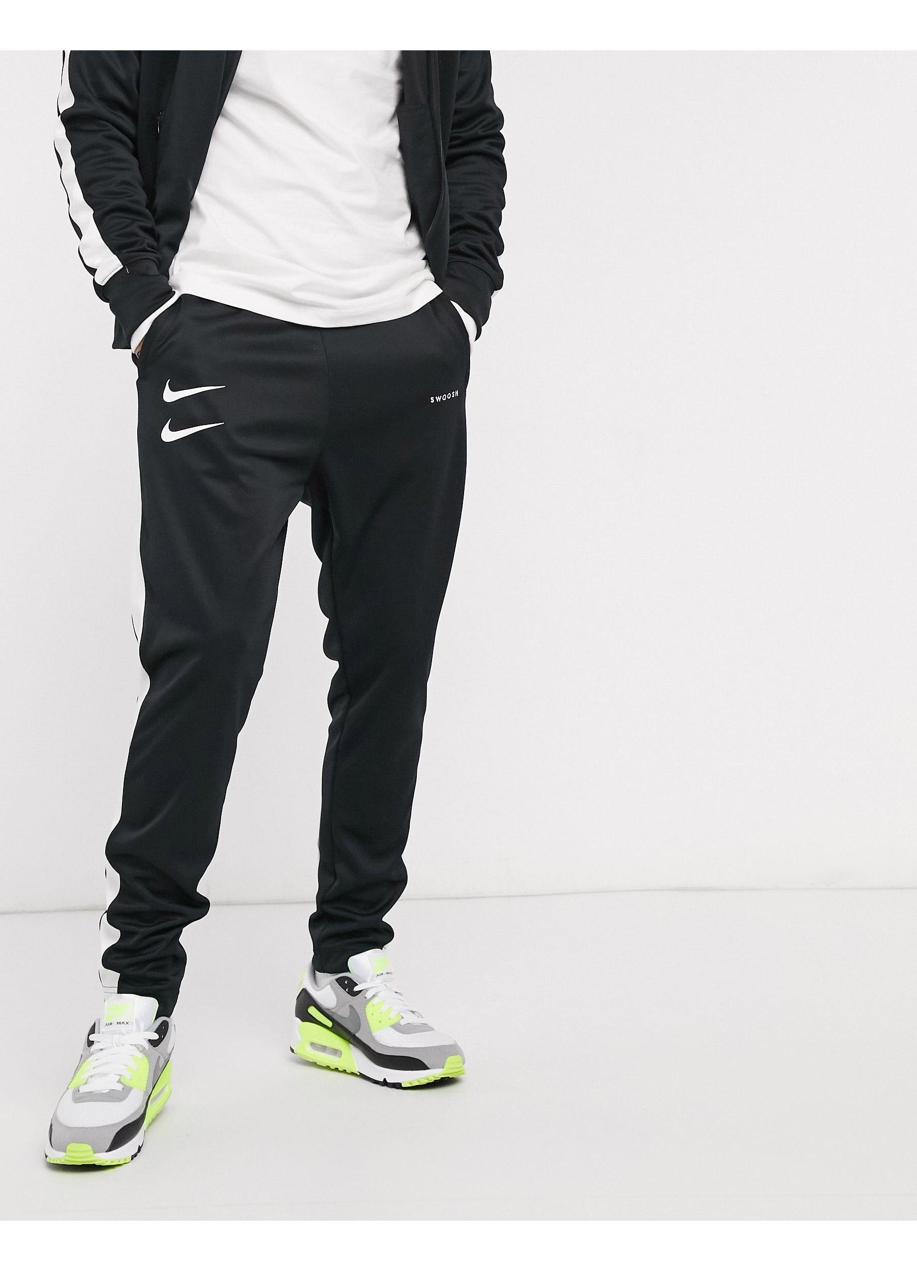 Nike Synthetic Swoosh Polyknit Trackies in Black for Men | Lyst