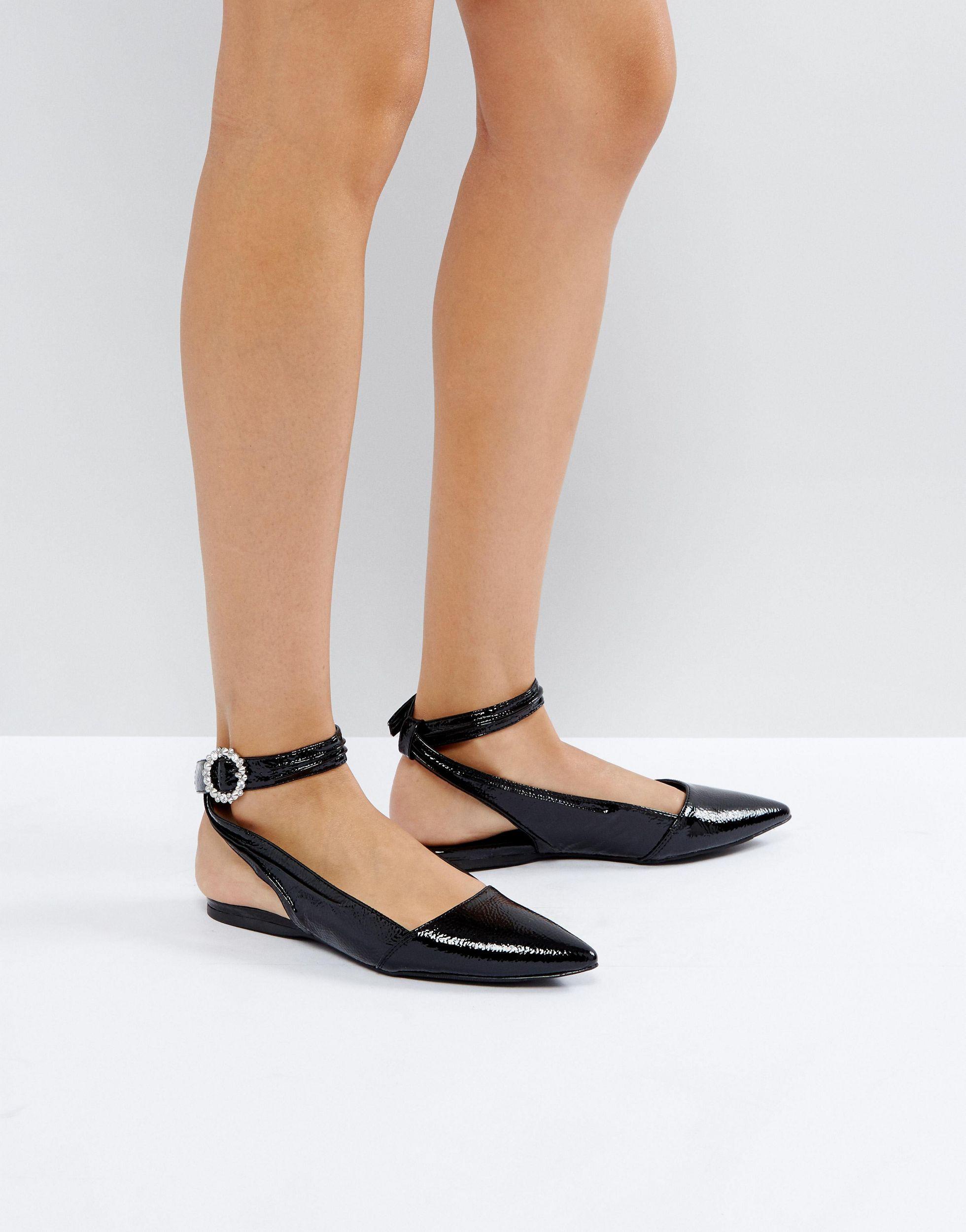 flat shoes with strap around ankle