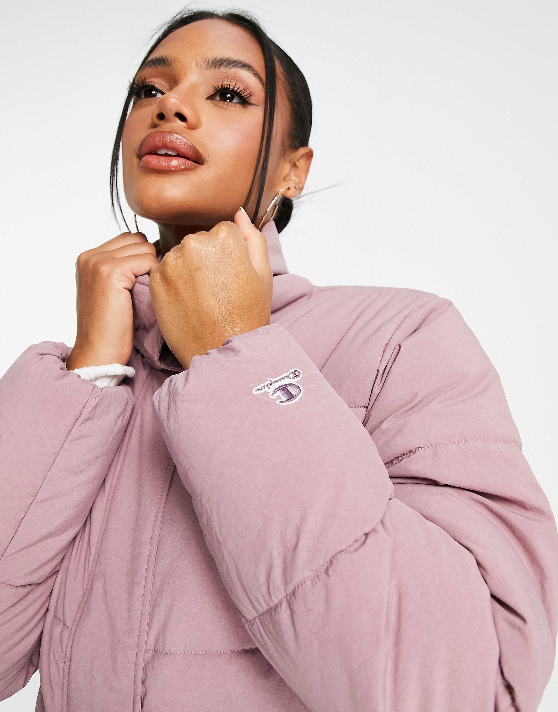Doudoune a petit logo Champion en coloris Rose Lyst