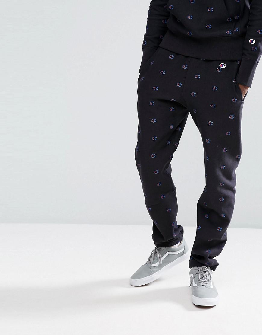 lommetørklæde kassette tilfældig Champion Cotton Joggers With All Over Logo Print Exclusive To Asos in Black  for Men - Lyst