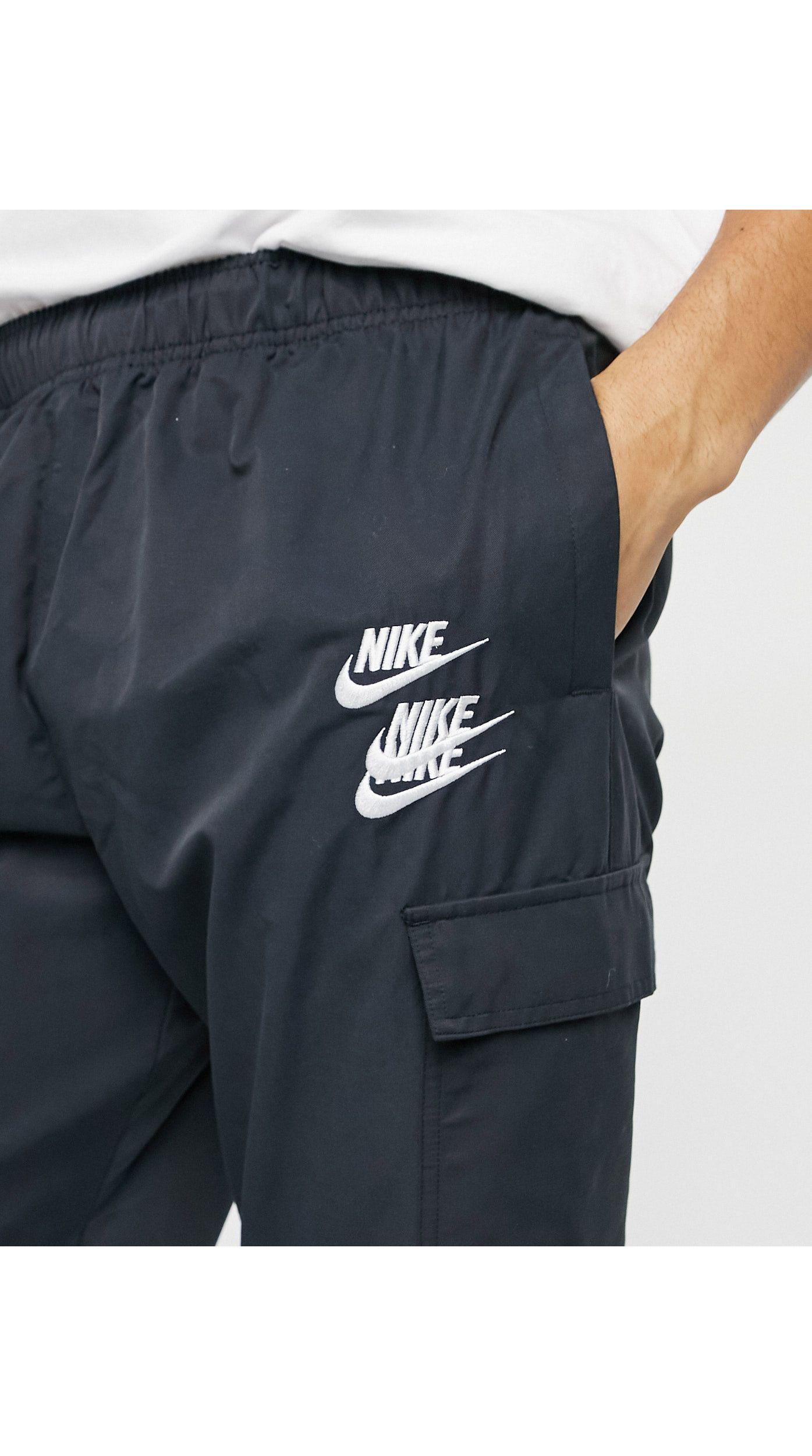 nike swoosh on tour pack cuffed cargo joggers in black