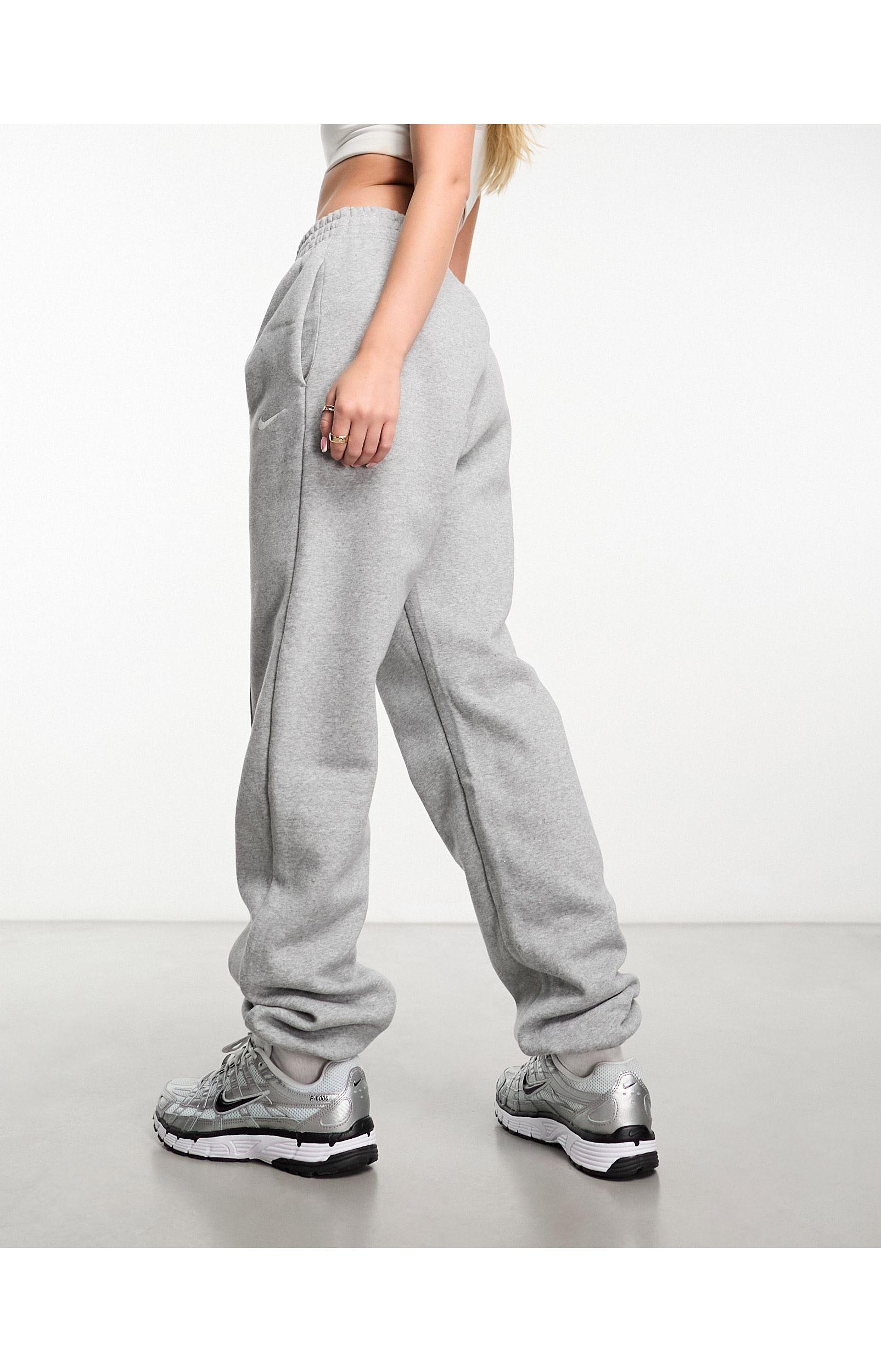 Nike Mini Swoosh Oversized joggers in Grey