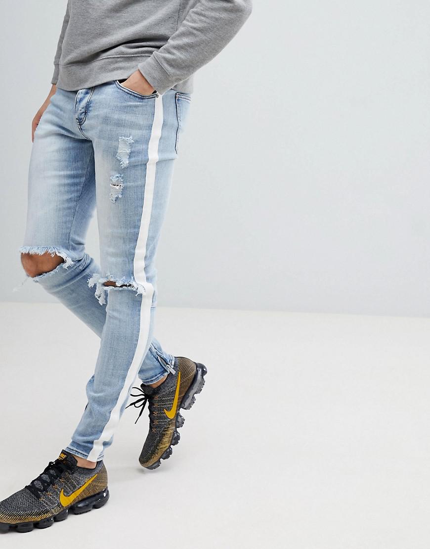 light blue jeans with side stripe