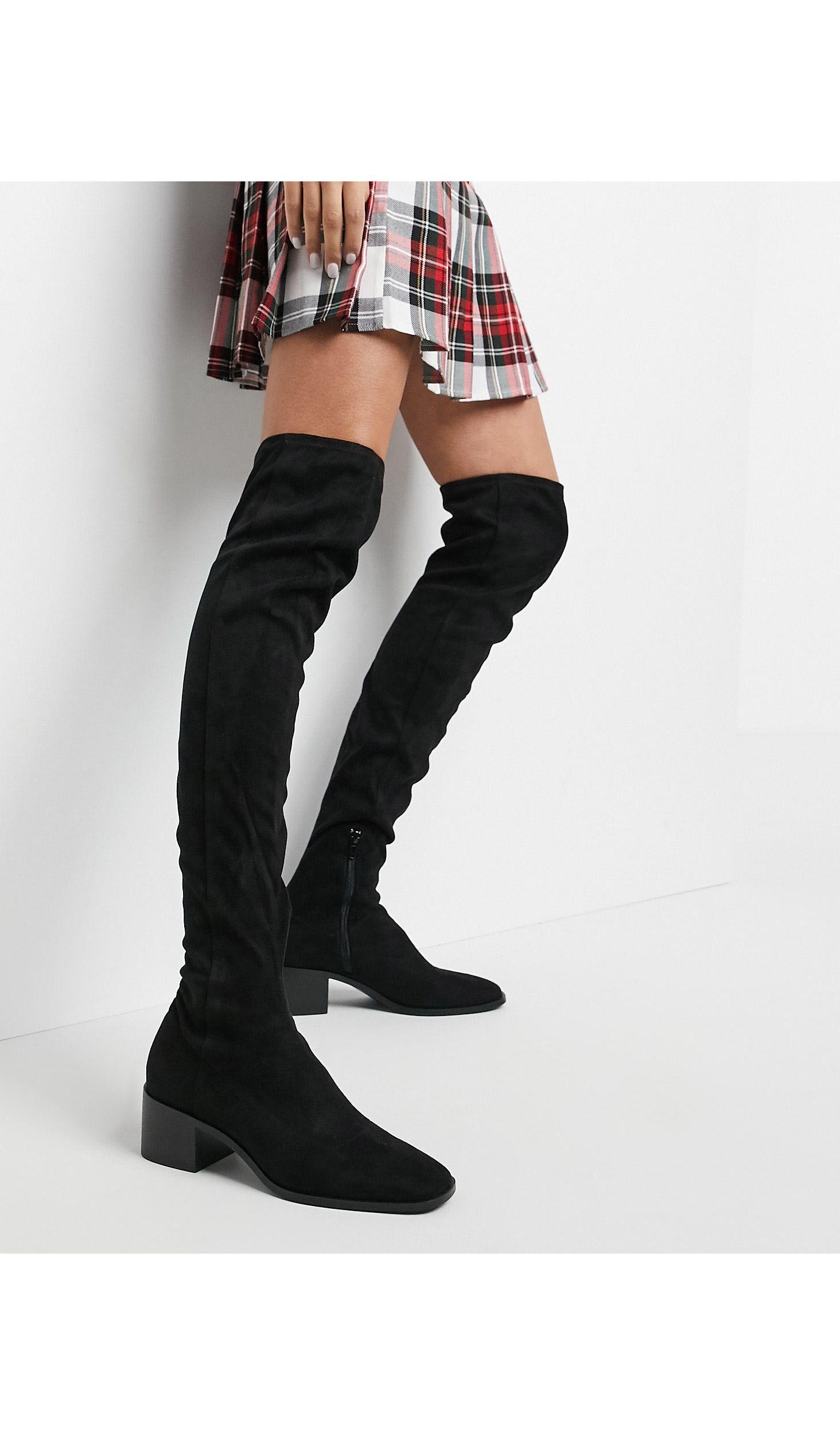 vendaje Corchete deshonesto Botas altas negras Mango de color Negro | Lyst