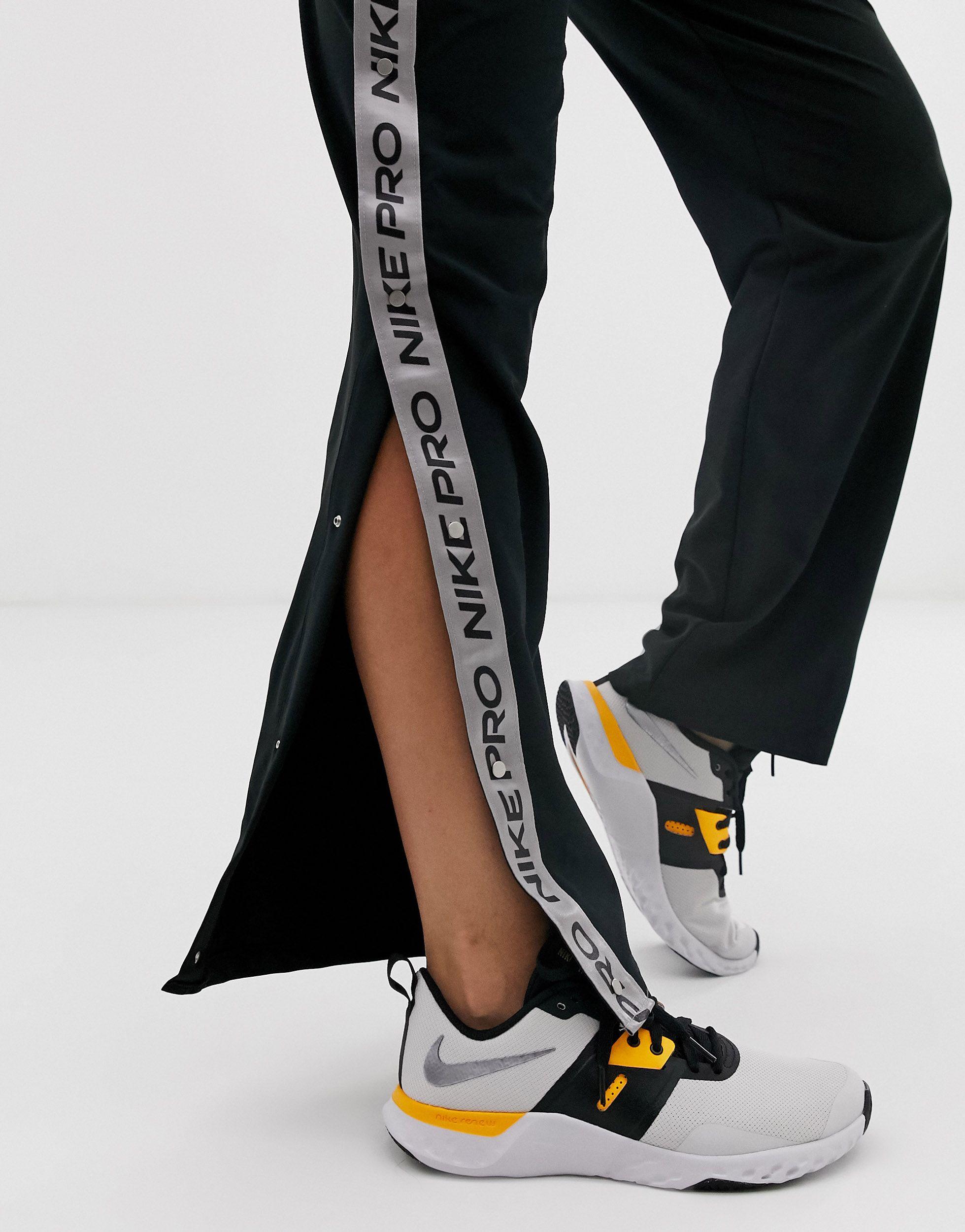 nike sportswear pant popper