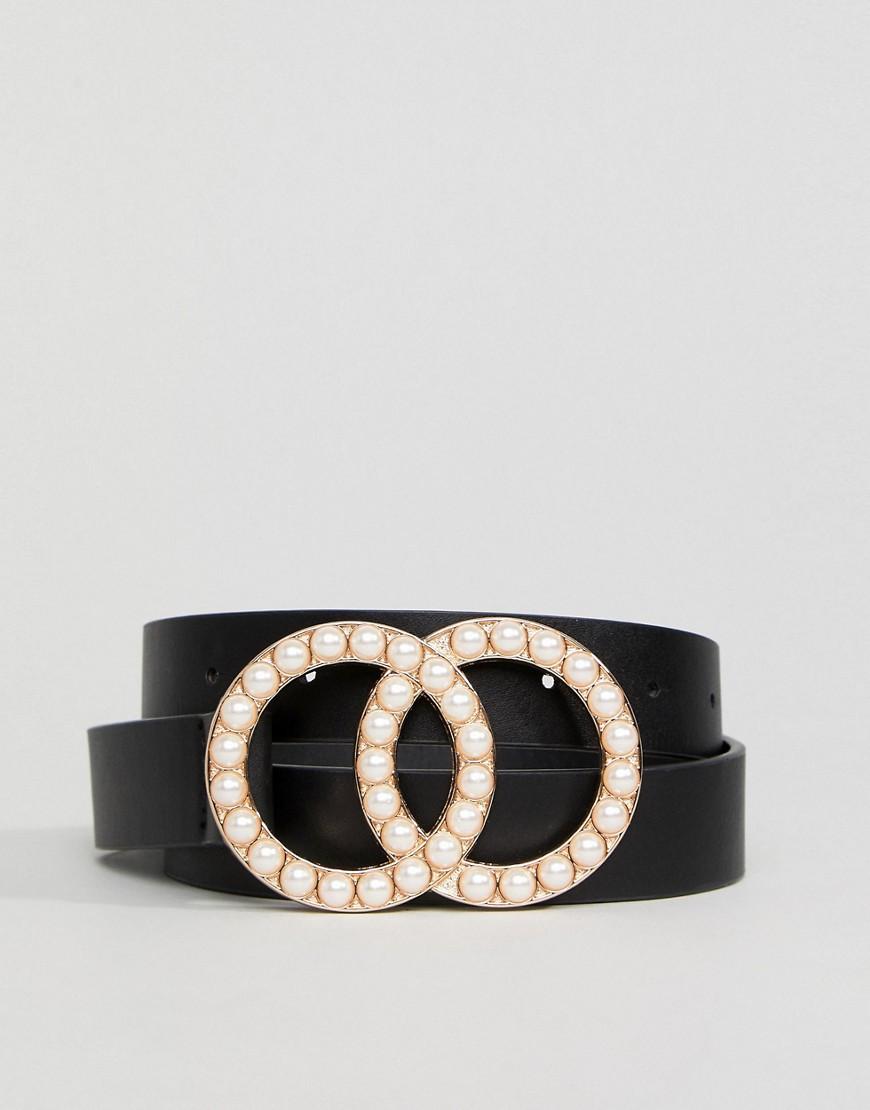 Cintura per vita e fianchi con fibbia a due cerchi decorati con perle di  ASOS in Nero | Lyst