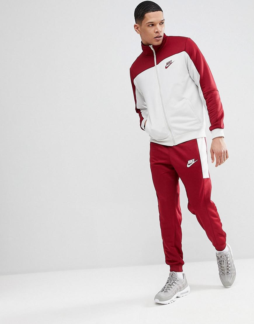 red and white nike tracksuit