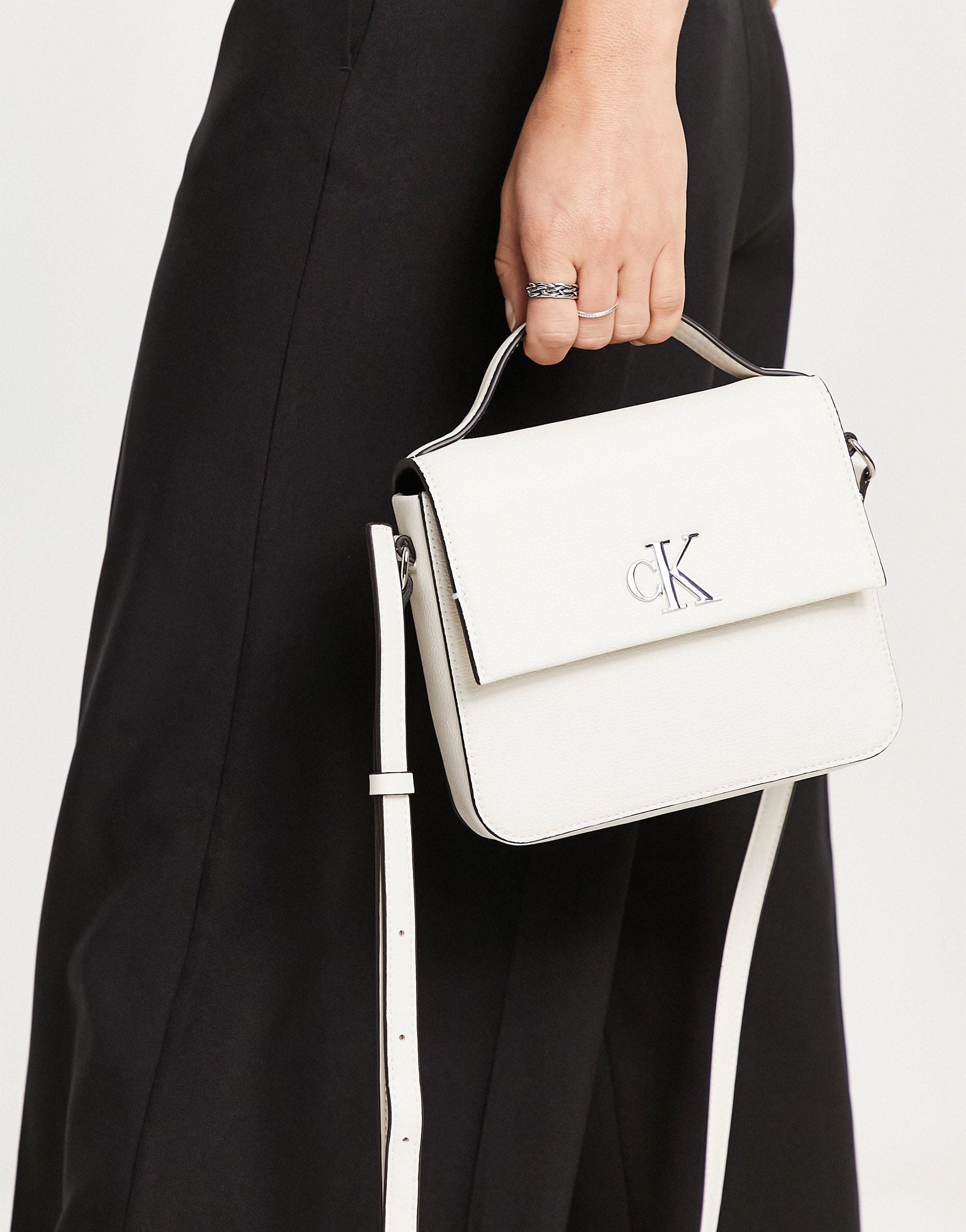 Calvin Klein Monogram Logo Cross Body Bag in White | Lyst