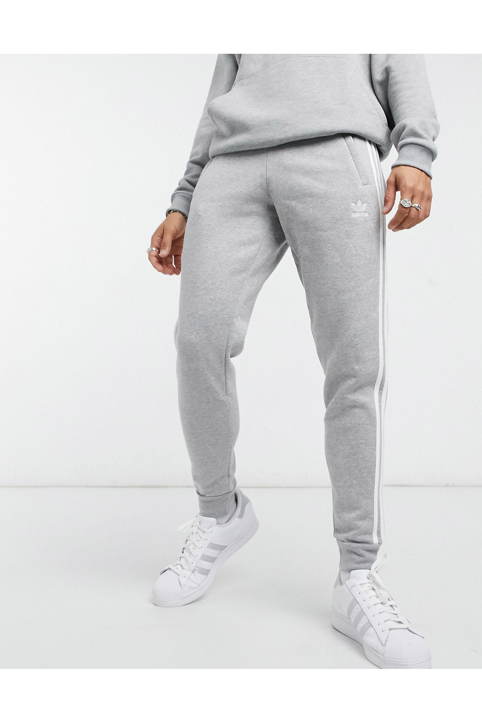 adidas Originals – adicolor – eng geschnittene jogginghose mit den drei  streifen in Grau für Herren | Lyst DE