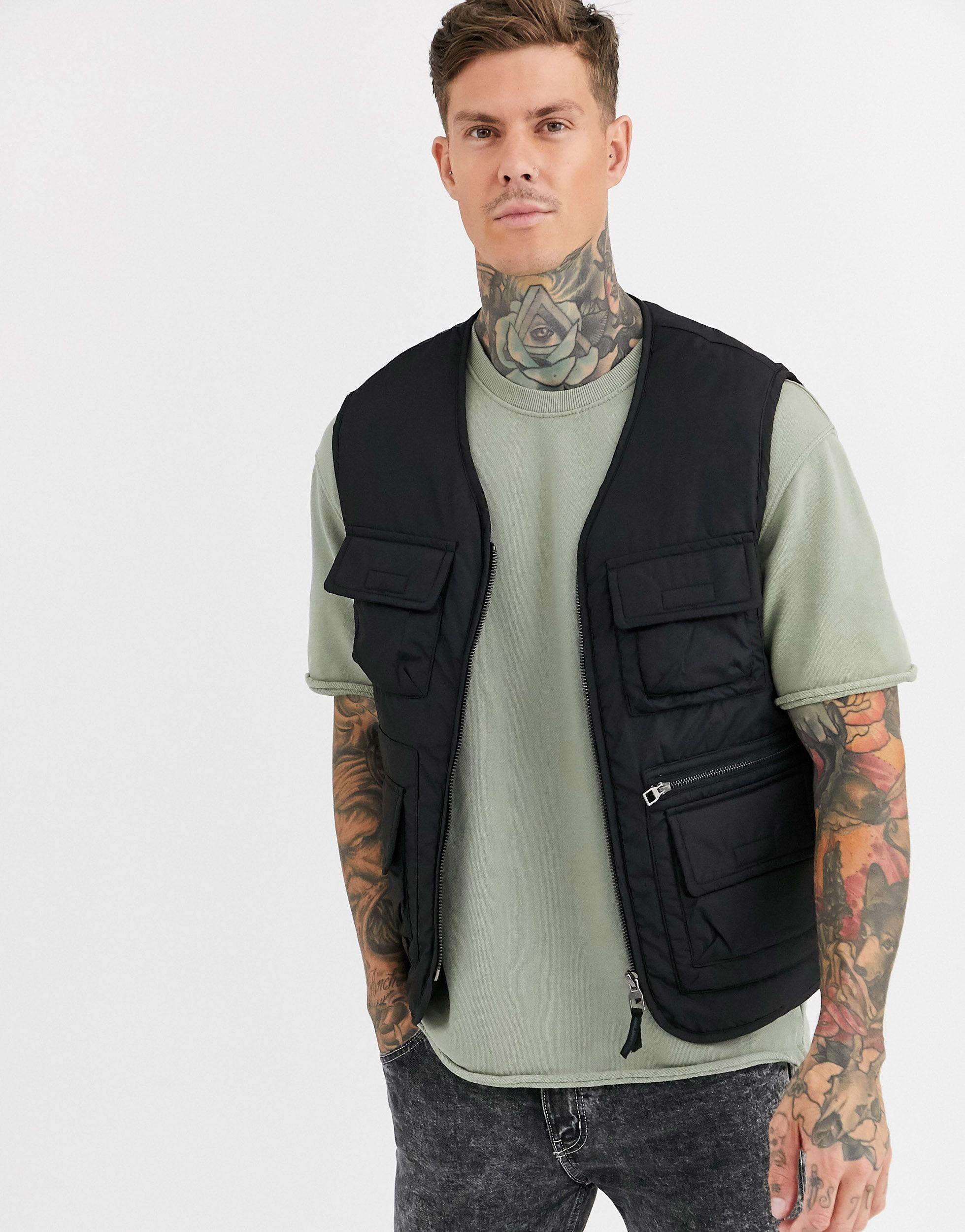 Piumino smanicato multitasche neroBershka in Materiale sintetico da Uomo  colore Nero | Lyst
