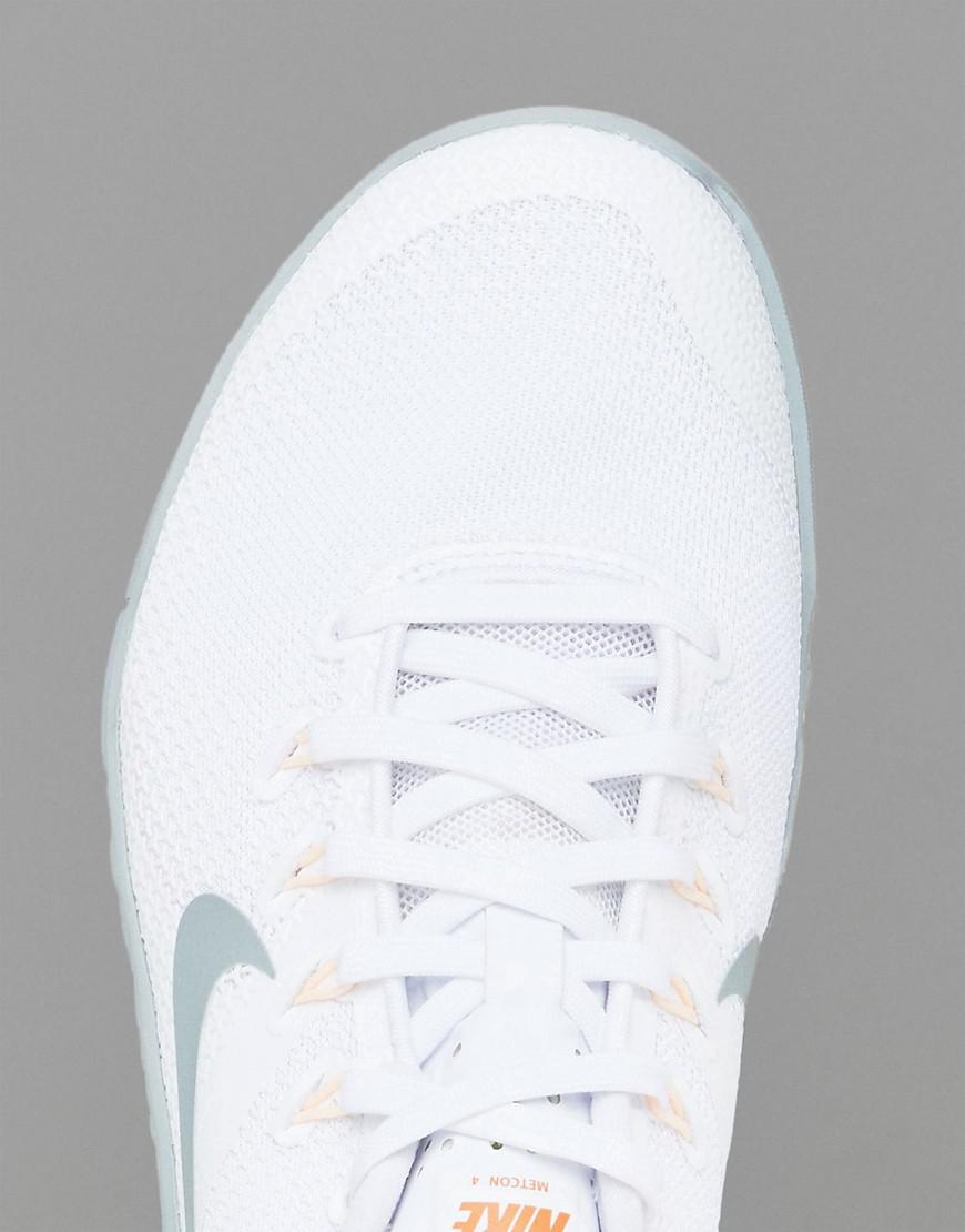 nike training metcon trainers in white and peach