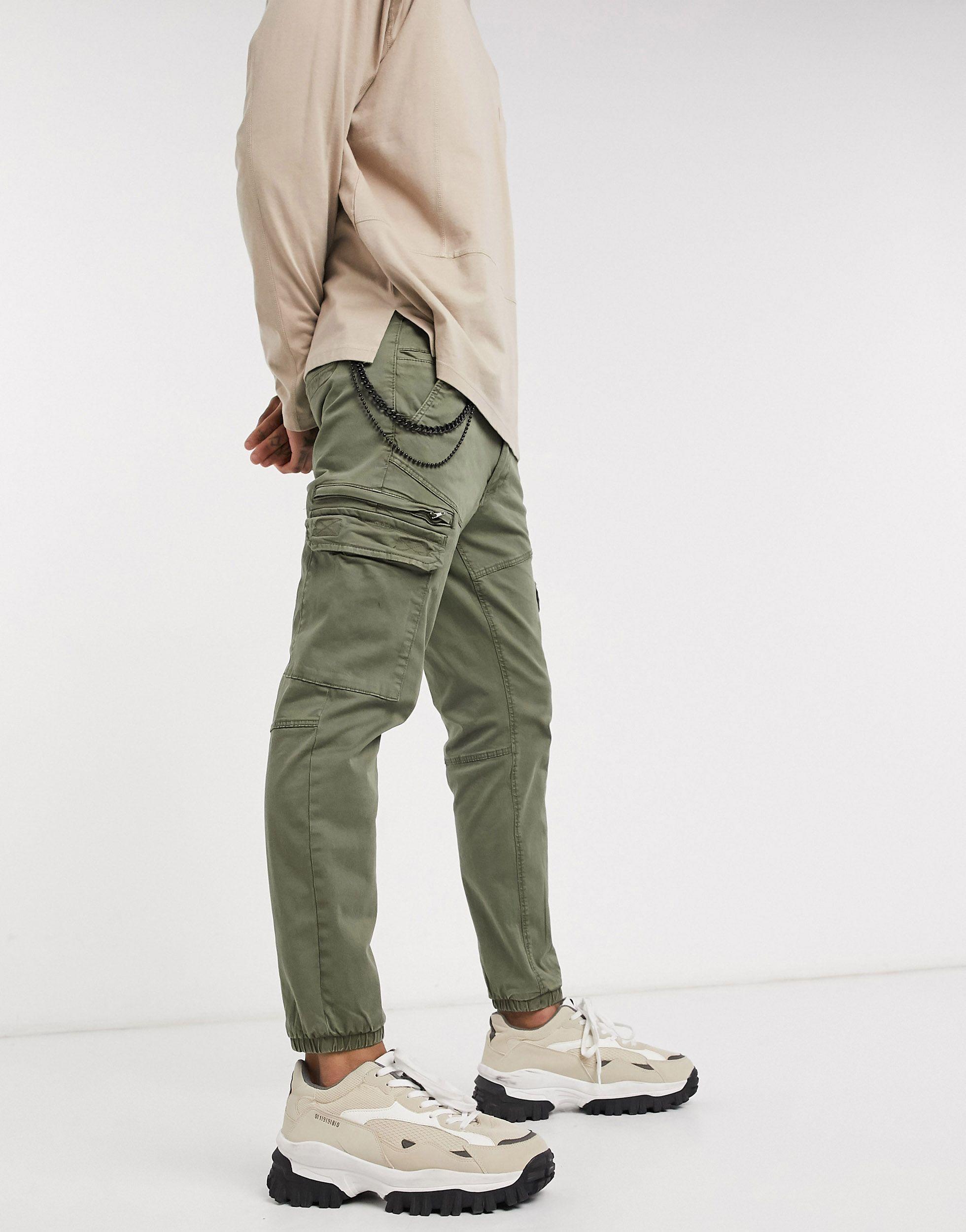 Pantaloni cargo con elastico sul fondo e catena kaki da Uomo di Pull\u0026Bear  in Neutro | Lyst