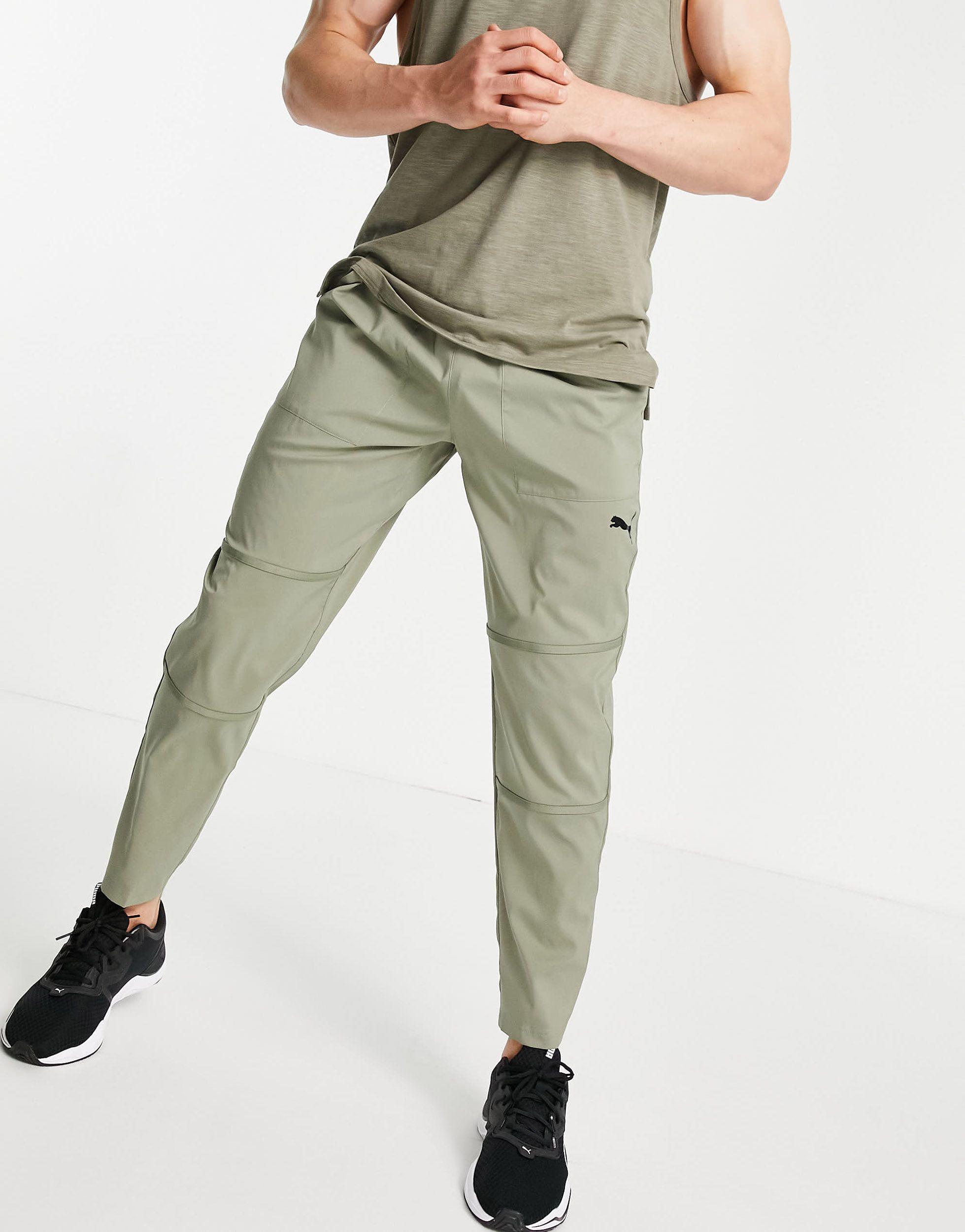 https://cdna.lystit.com/photos/asos/a8c7d951/puma-Grey-Training-Tech-Woven-Track-Pants.jpeg