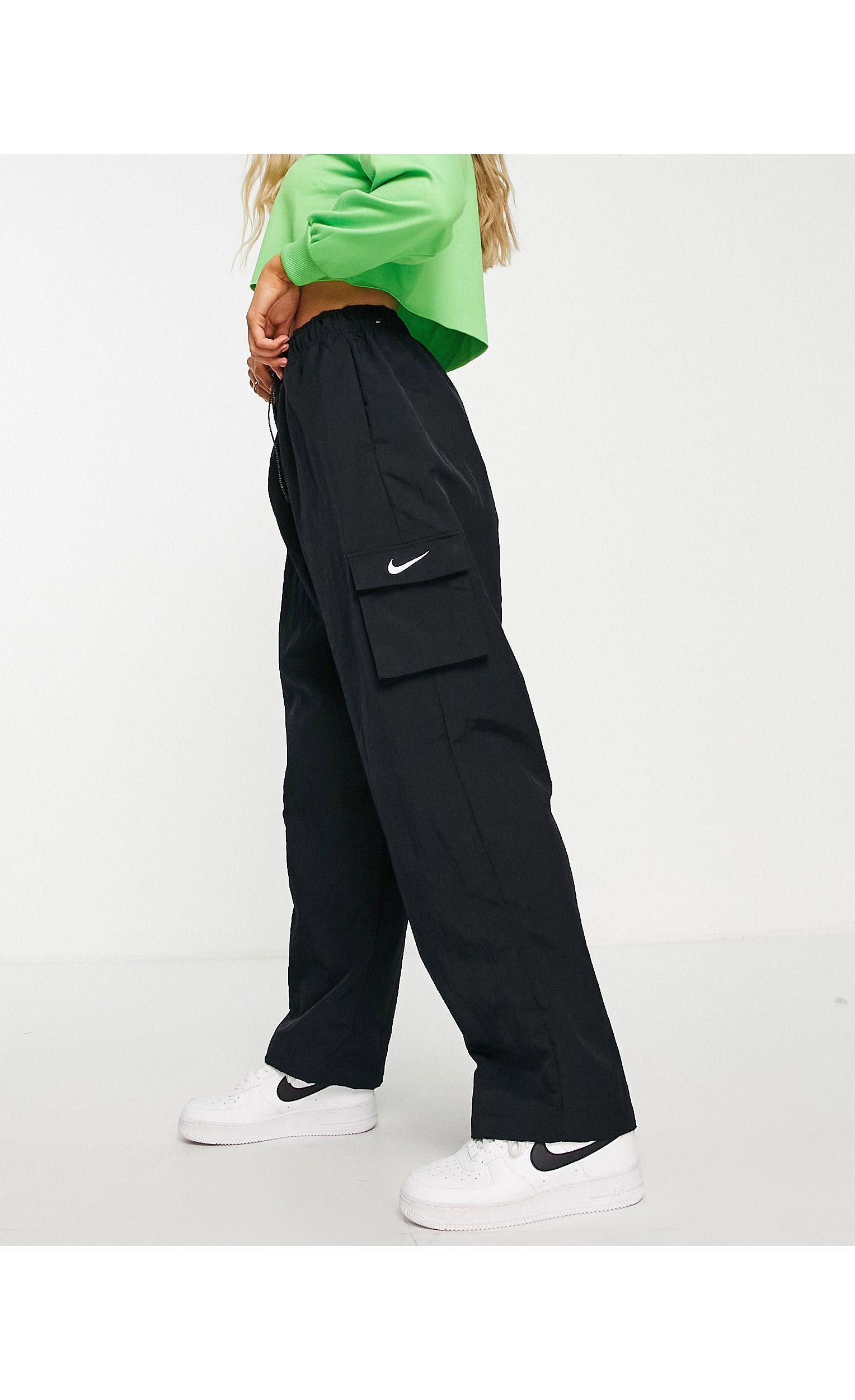 Nike Mini Swoosh Cargo Pants in Black | Lyst Canada