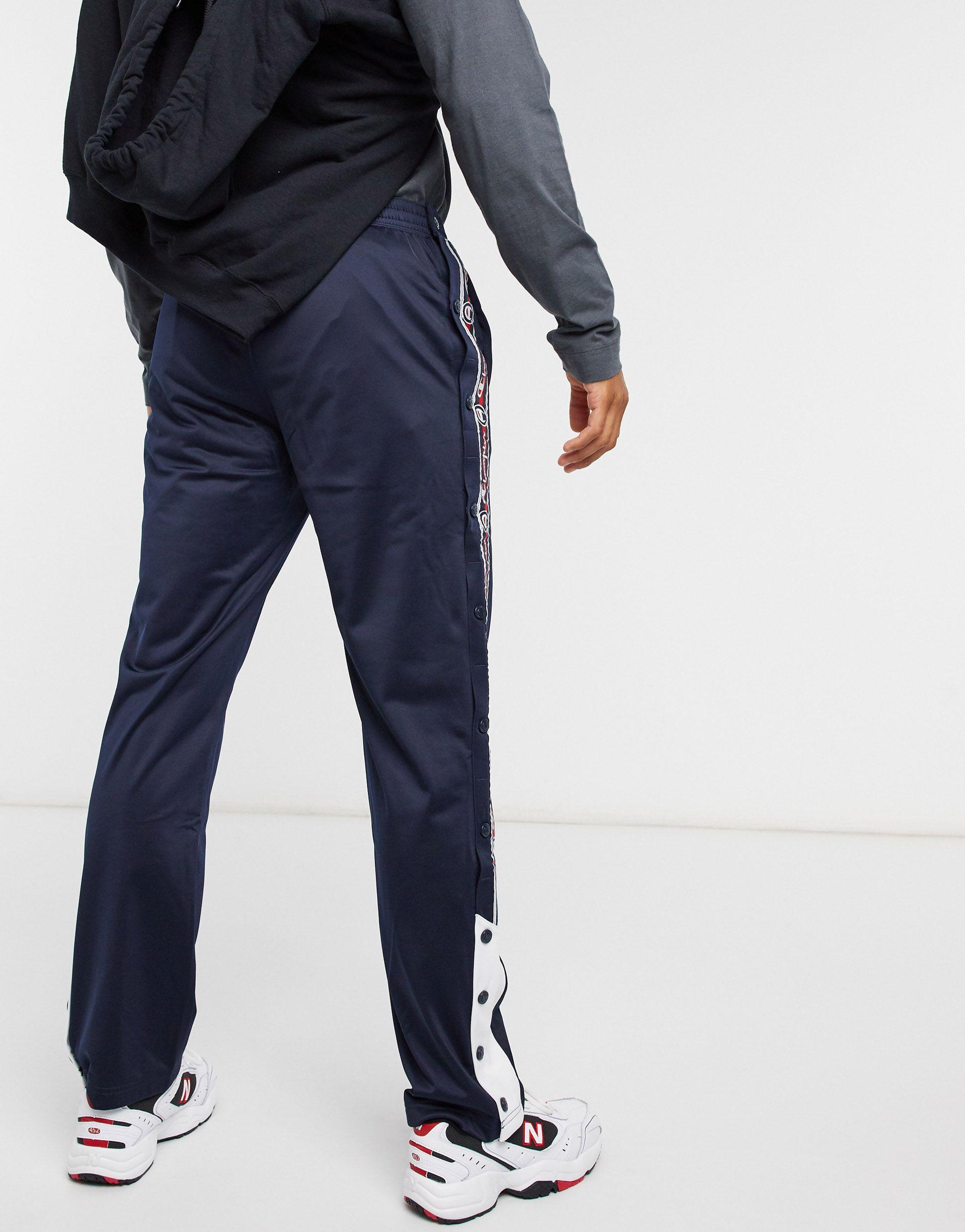 Pantaloni con bottoni a pressione e nastro laterale blu da Uomo di Champion  in Blu | Lyst