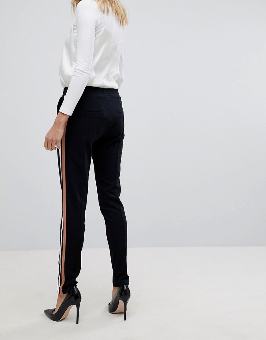 Pantalon avec bande sur le côté Vero Moda en coloris Noir | Lyst