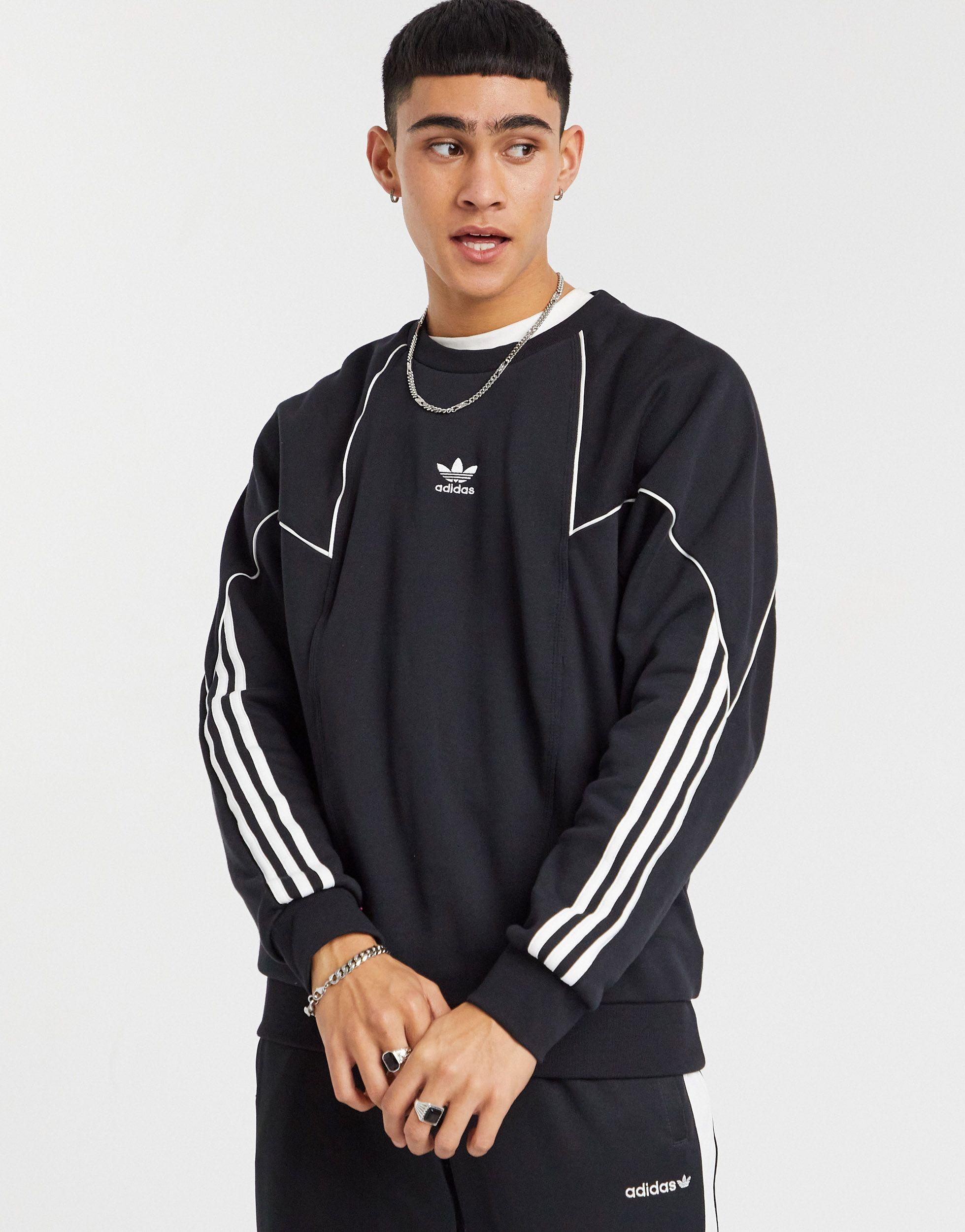 sweat adidas avec logo sur les manches