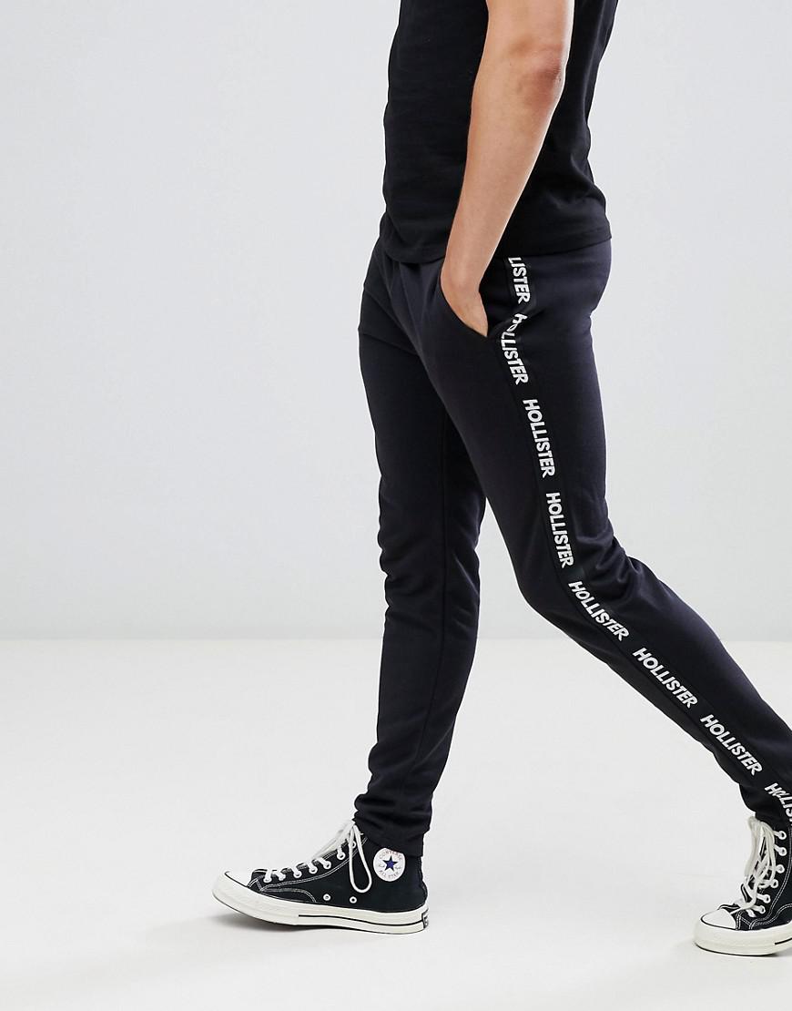 Hollister Logo Side Tape Track Pants In Black for Men