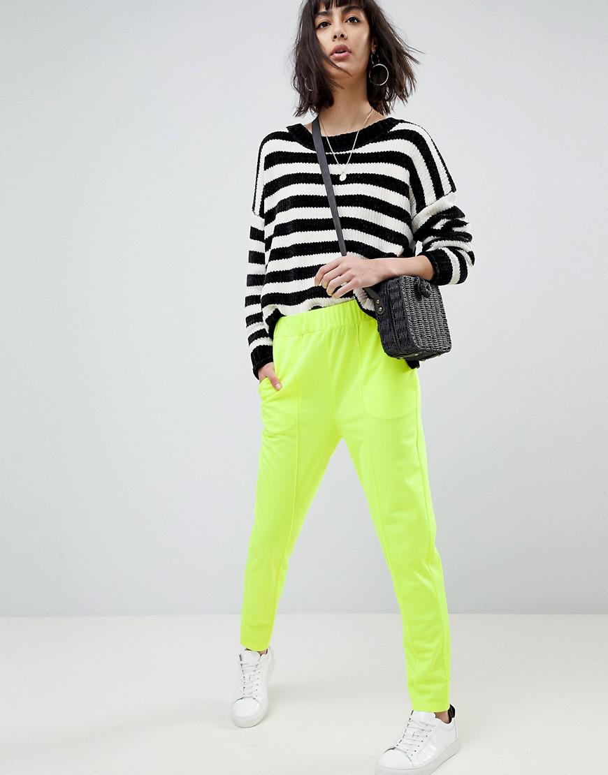 neon yellow track pants