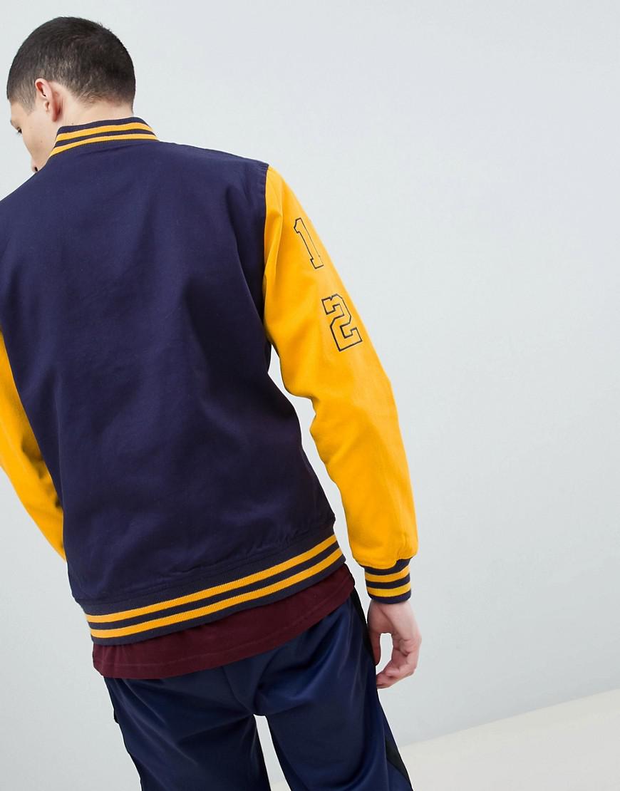 Bomber universitaire homme Clearance