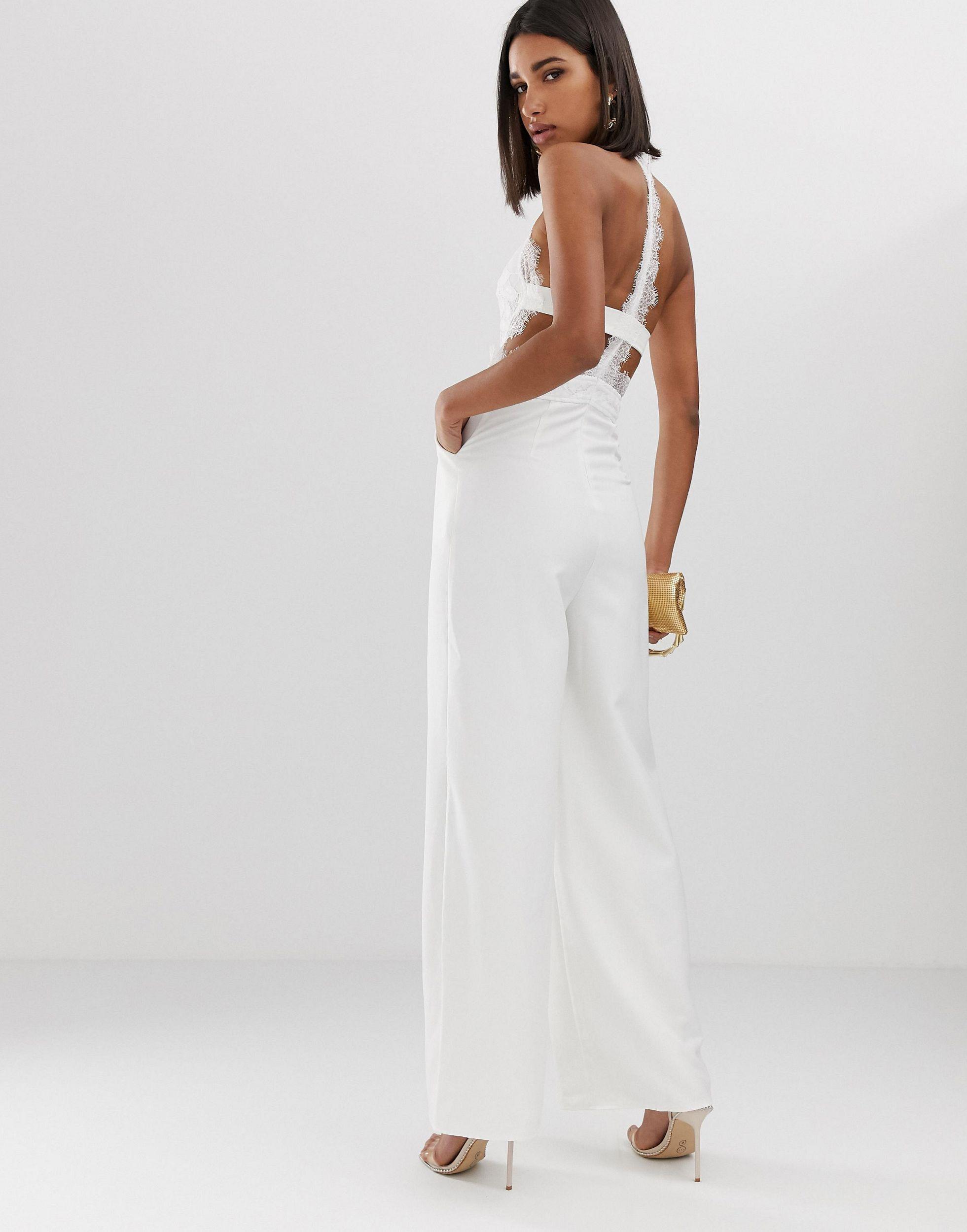 Combinaison Dos Nu Avec Grand Decollete Dos Et Fentes Hauteur Cuisse Dentelle Love Triangle En Coloris Blanc Lyst