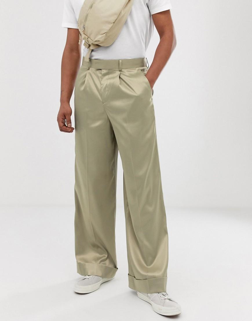 Pantaloni eleganti con fondo ampio in raso lucido olivaASOS in Satin da  Uomo colore Verde | Lyst